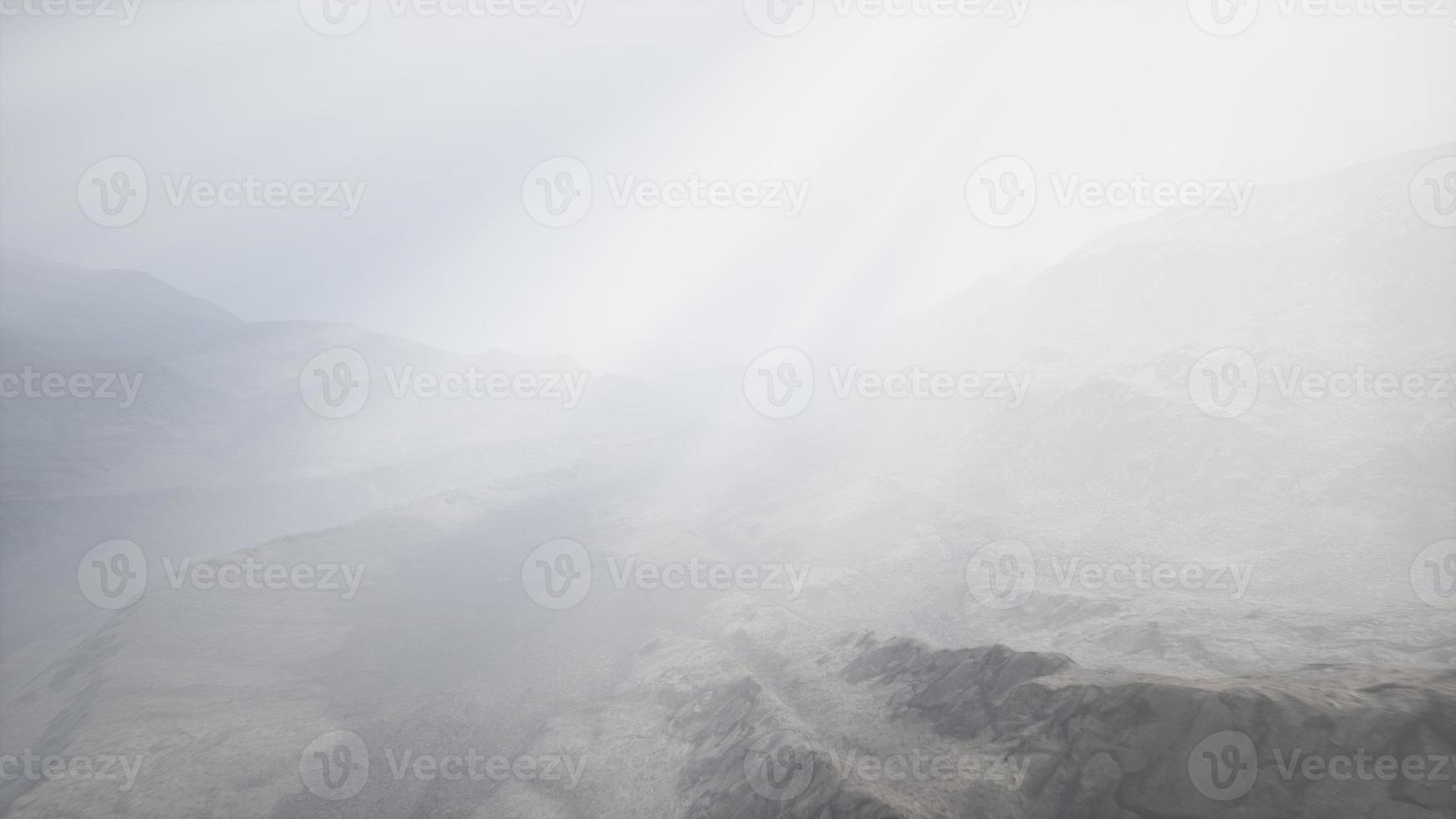 Sun Rays against the Backdrop of the Mountains photo