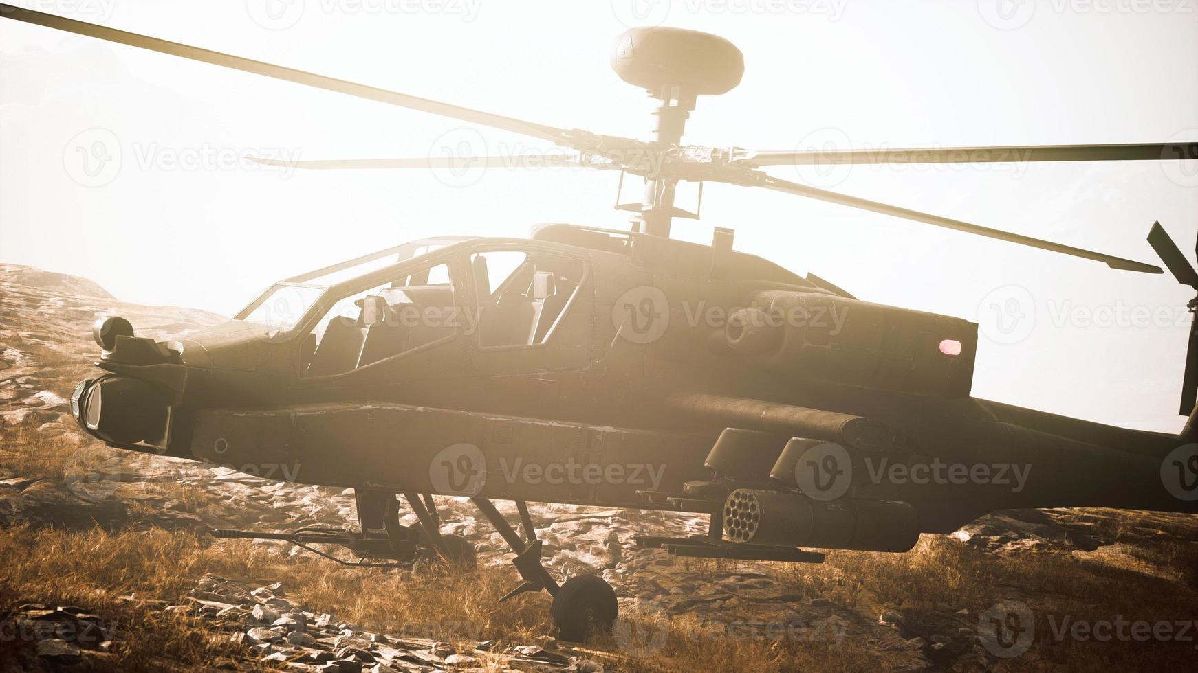 military helicopter in mountains at war photo