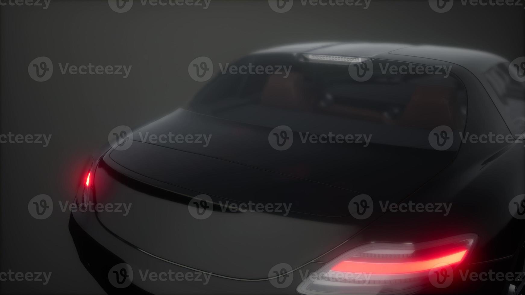 luxury sport car in dark studio with bright lights photo