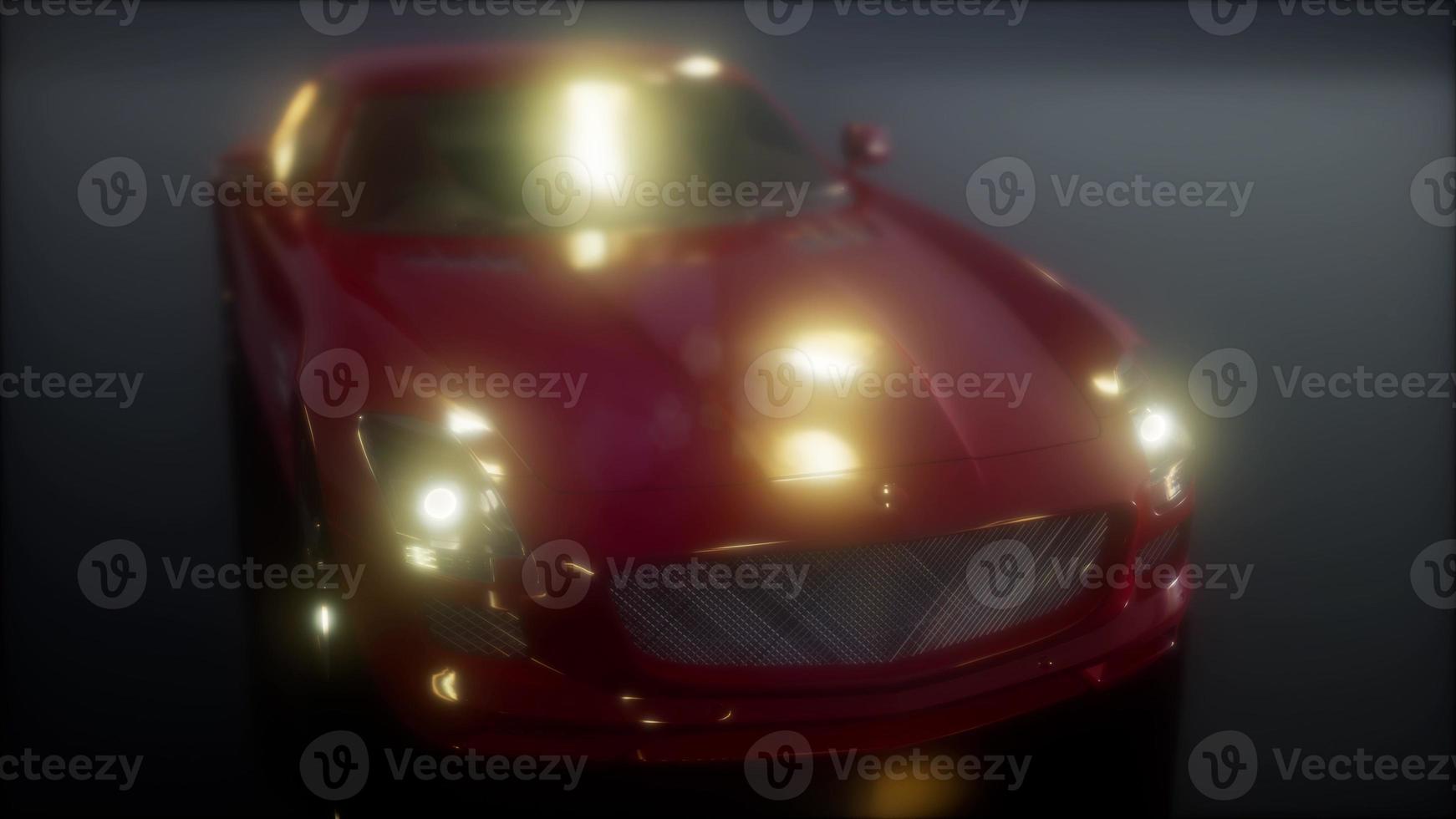 luxury sport car in dark studio with bright lights photo