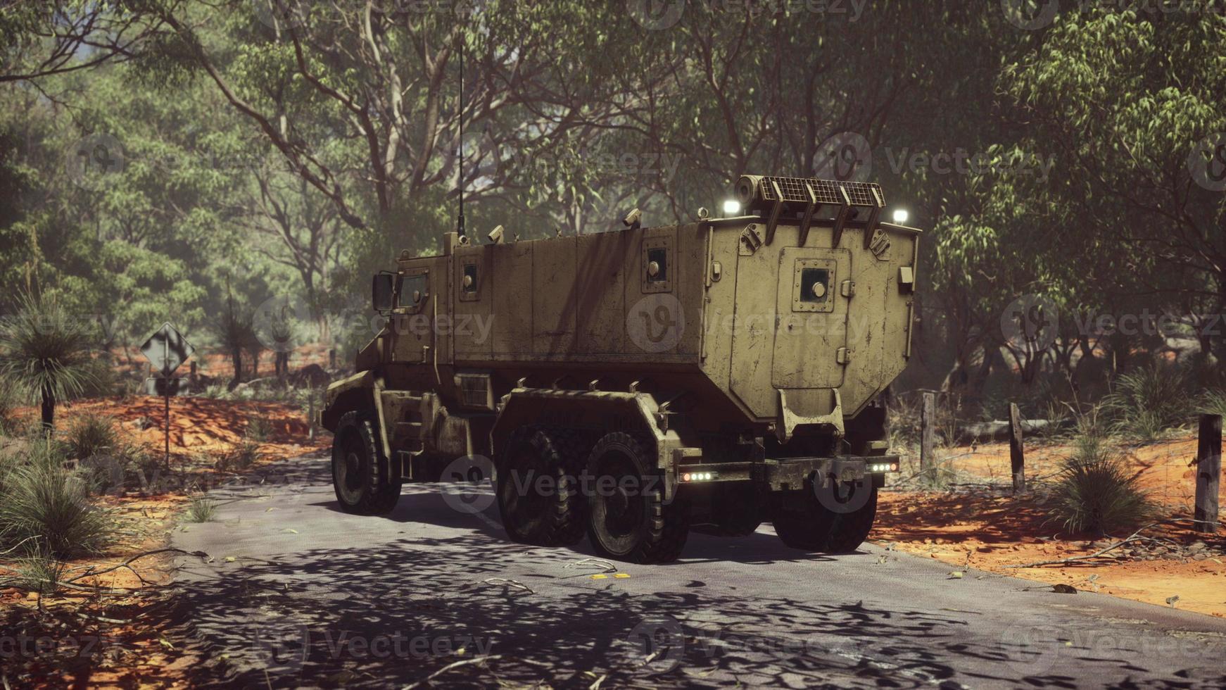 convoy armored vehicle on the road photo