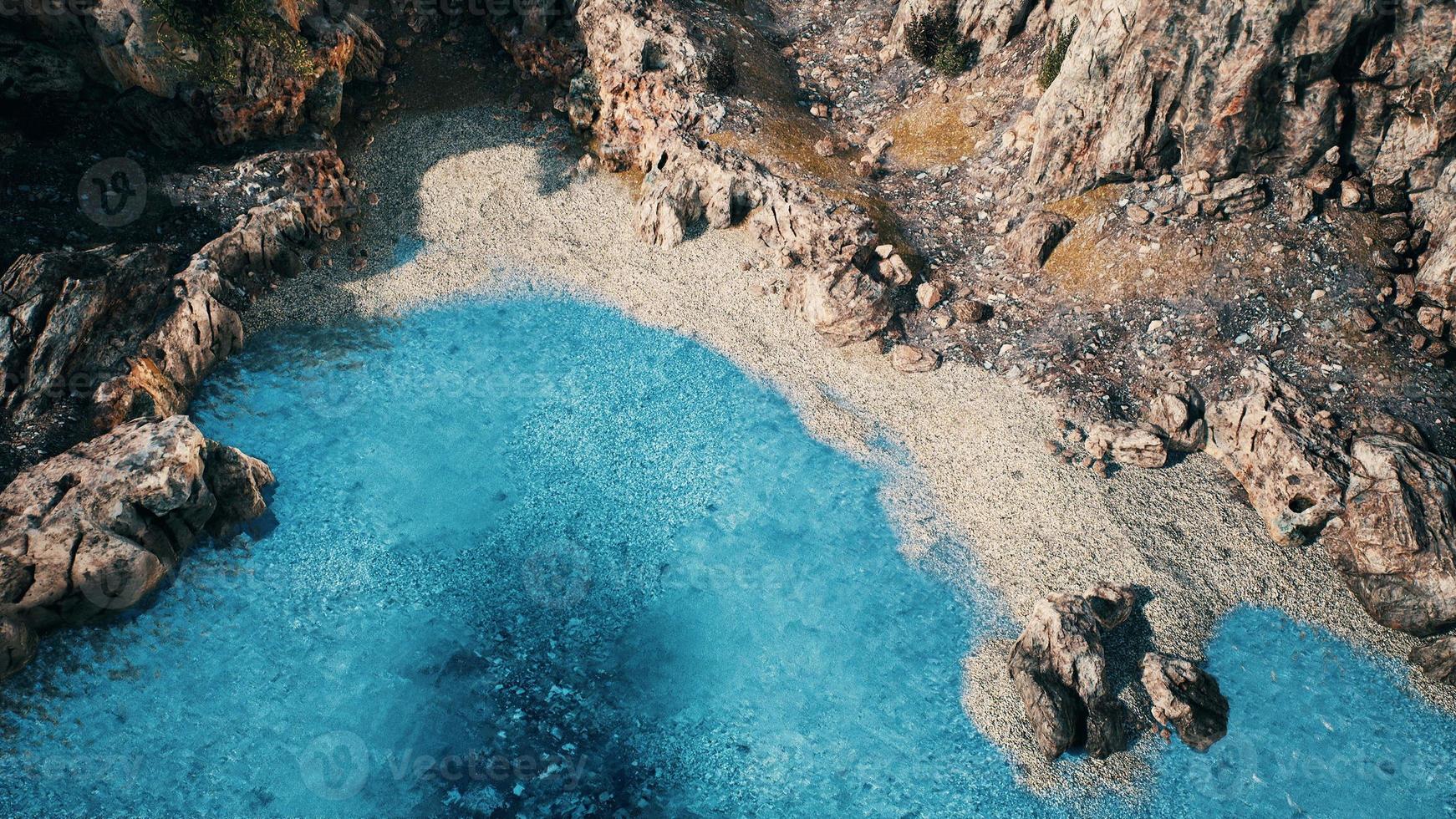 aerial view from flying drone of rocky island in Atlantic ocean photo