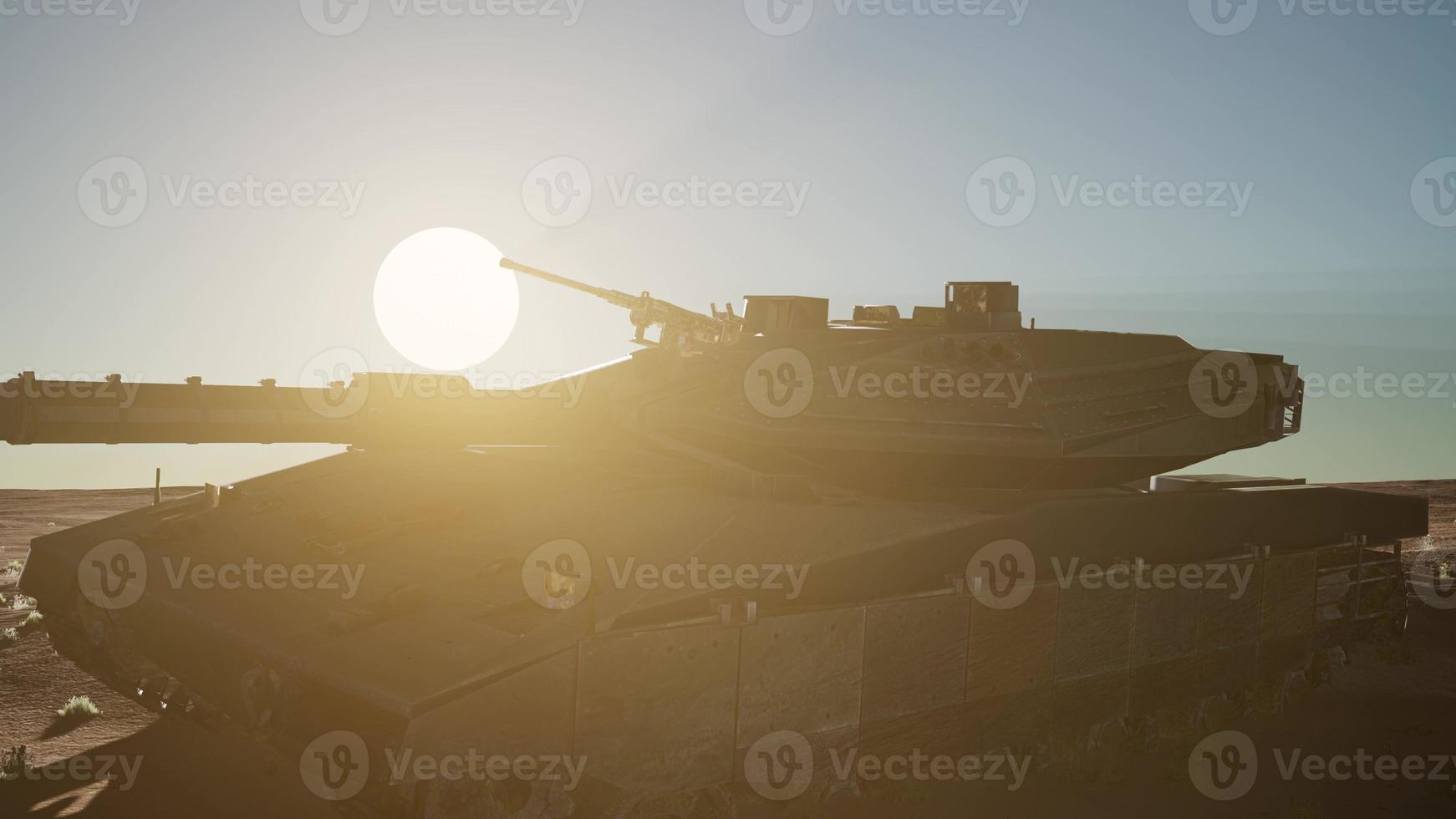 old rusty tank in the desert at sunset photo