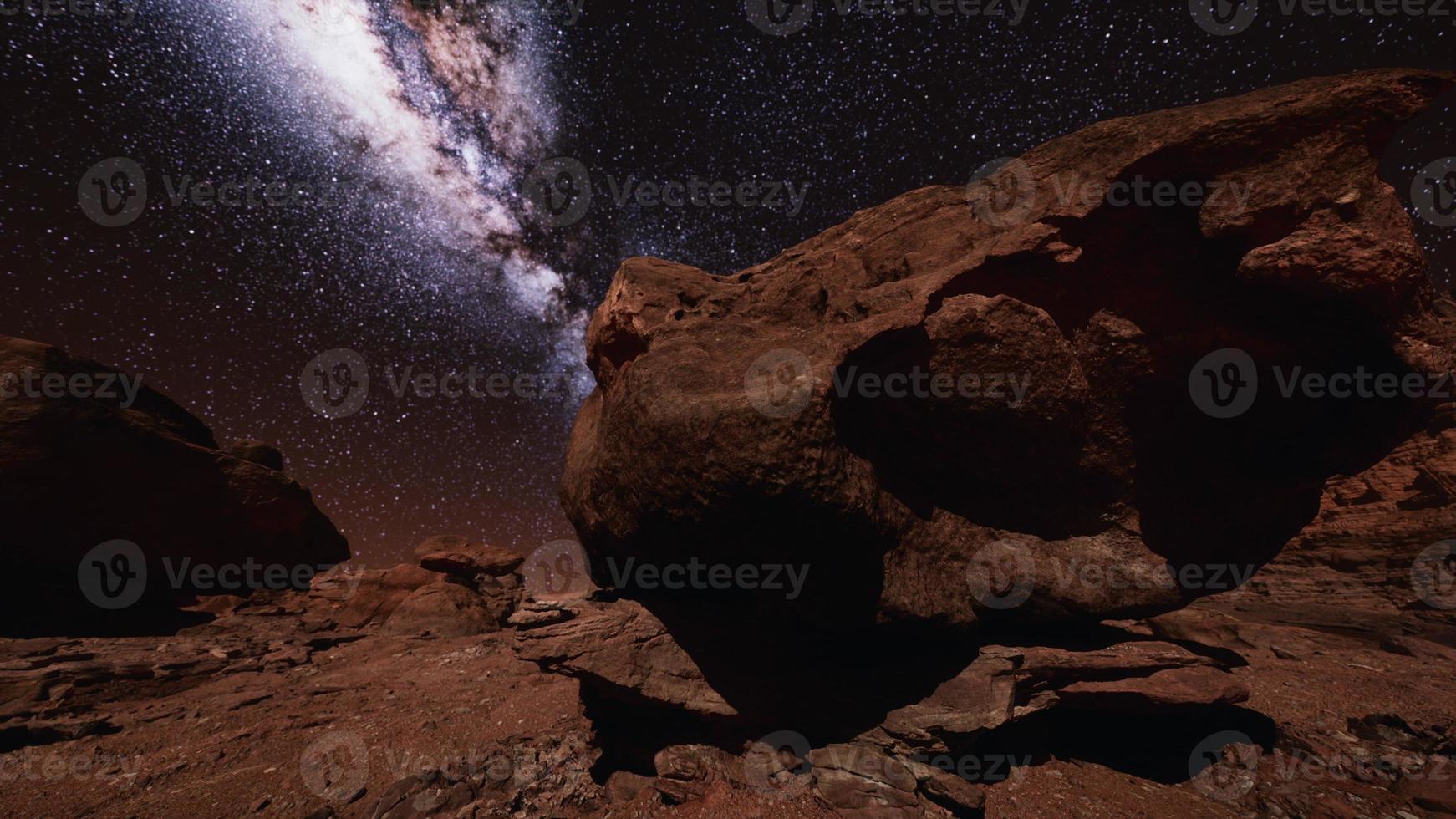 red rocks and milky way night sky in Moab Utah photo