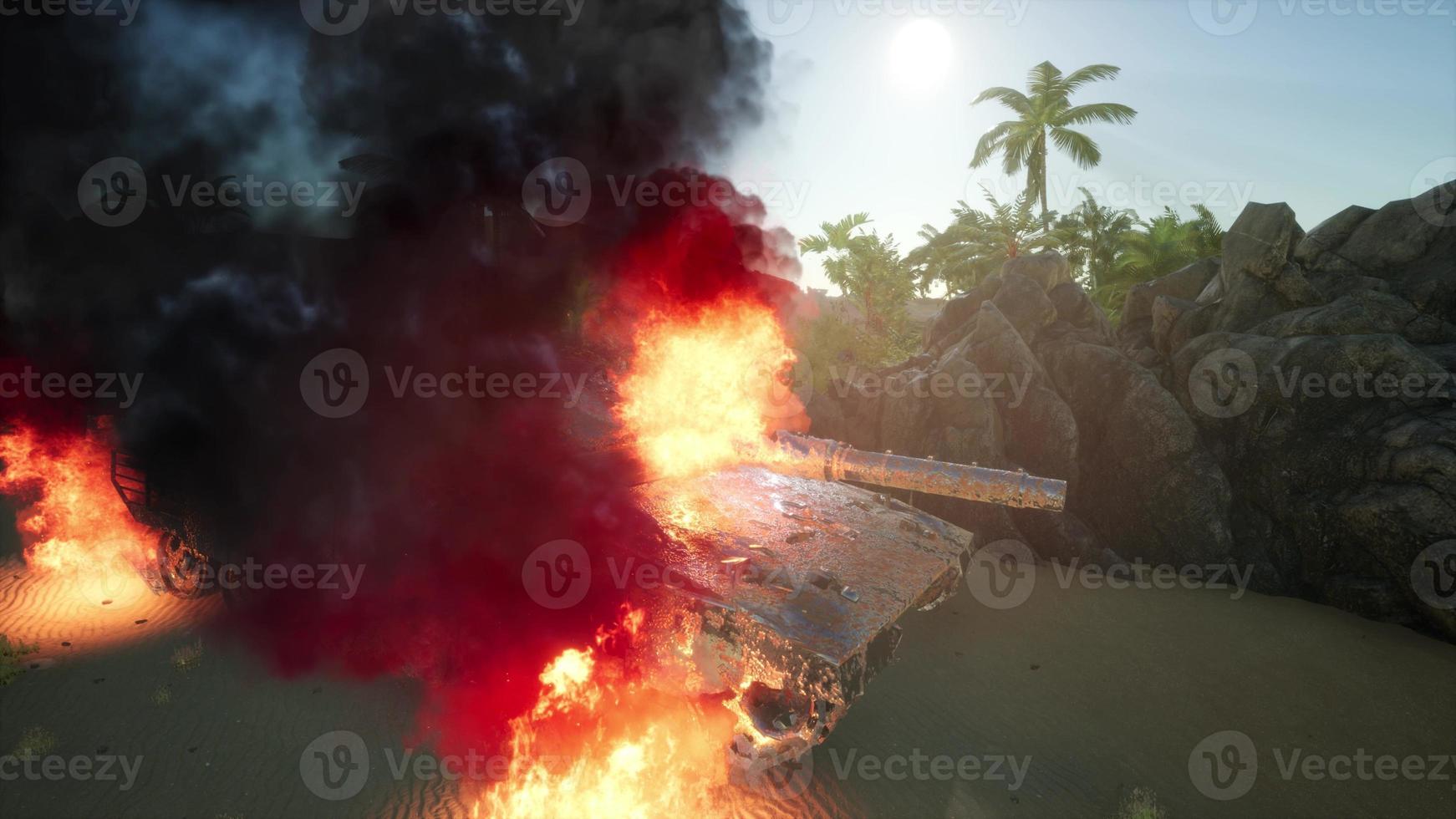 burned tank in the desert at sunset photo