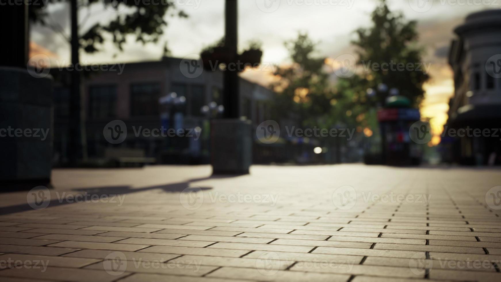 empty tiled floor and urban skyline photo