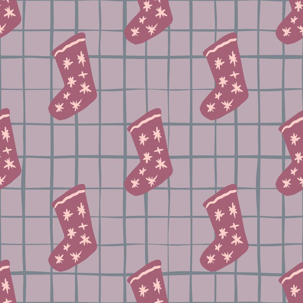 Pale seamless pattern with doodle pink christmas socks print. Chequered light purple background. Winter backdrop. vector
