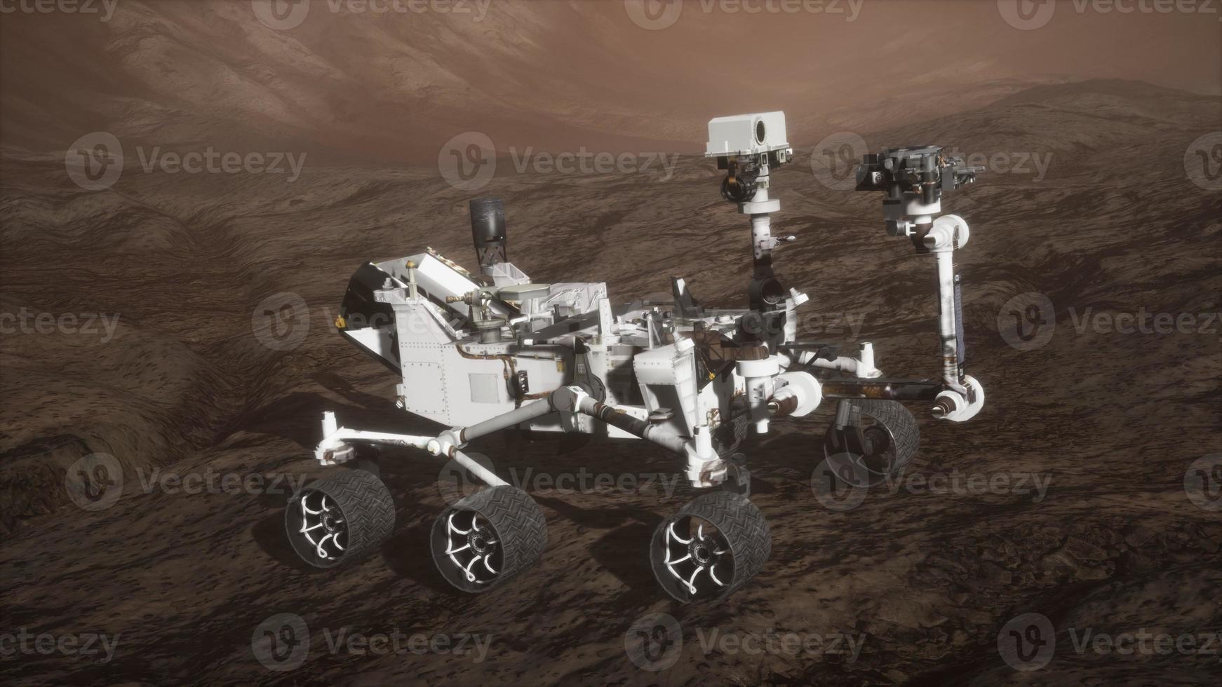 Curiosity Mars Rover exploring the surface of red planet. Elements of this image furnished by NASA photo