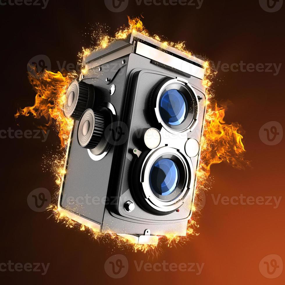 Vintage cinema camera in fire photo