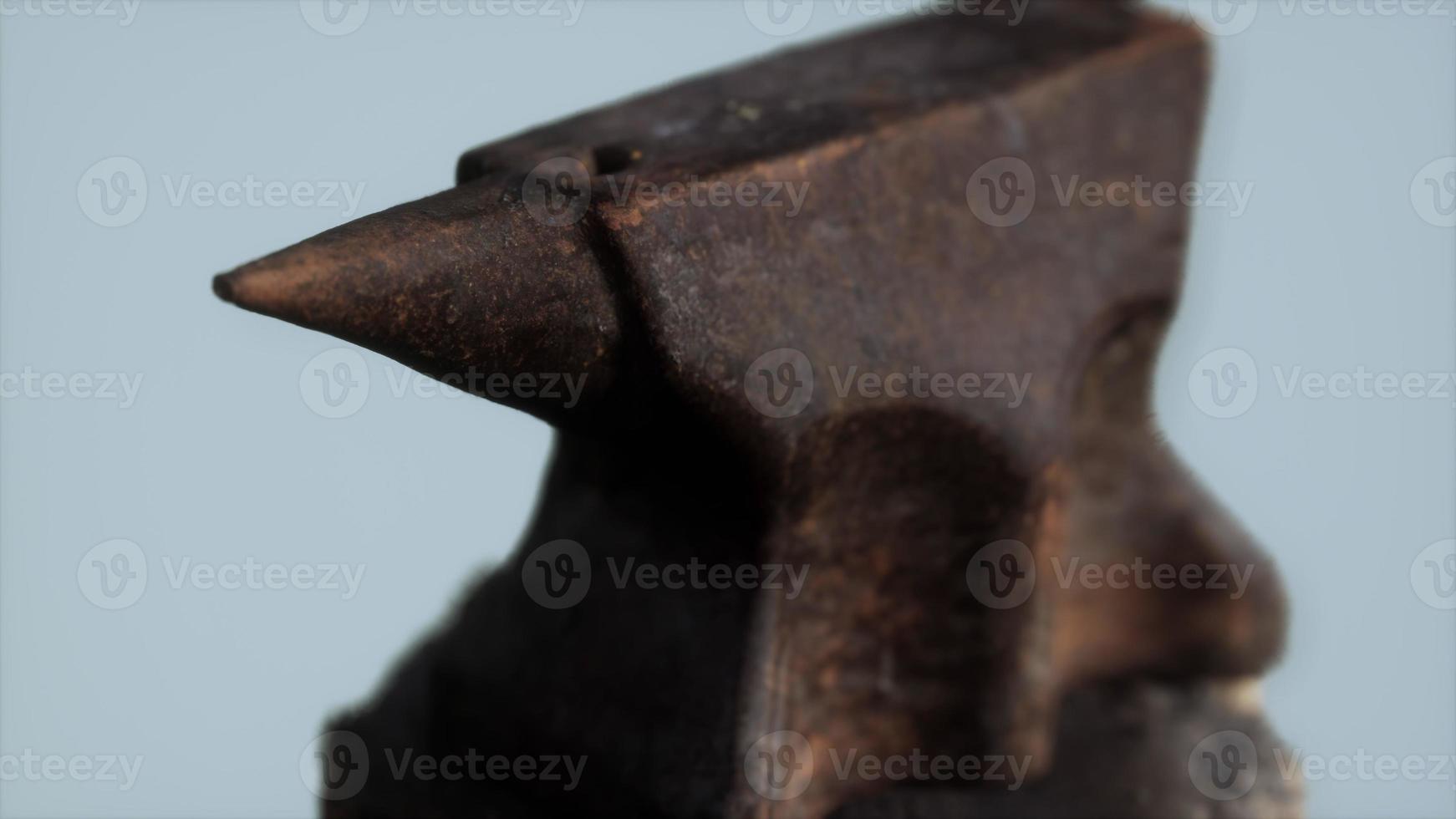 Old rusty anvil from the village forge photo