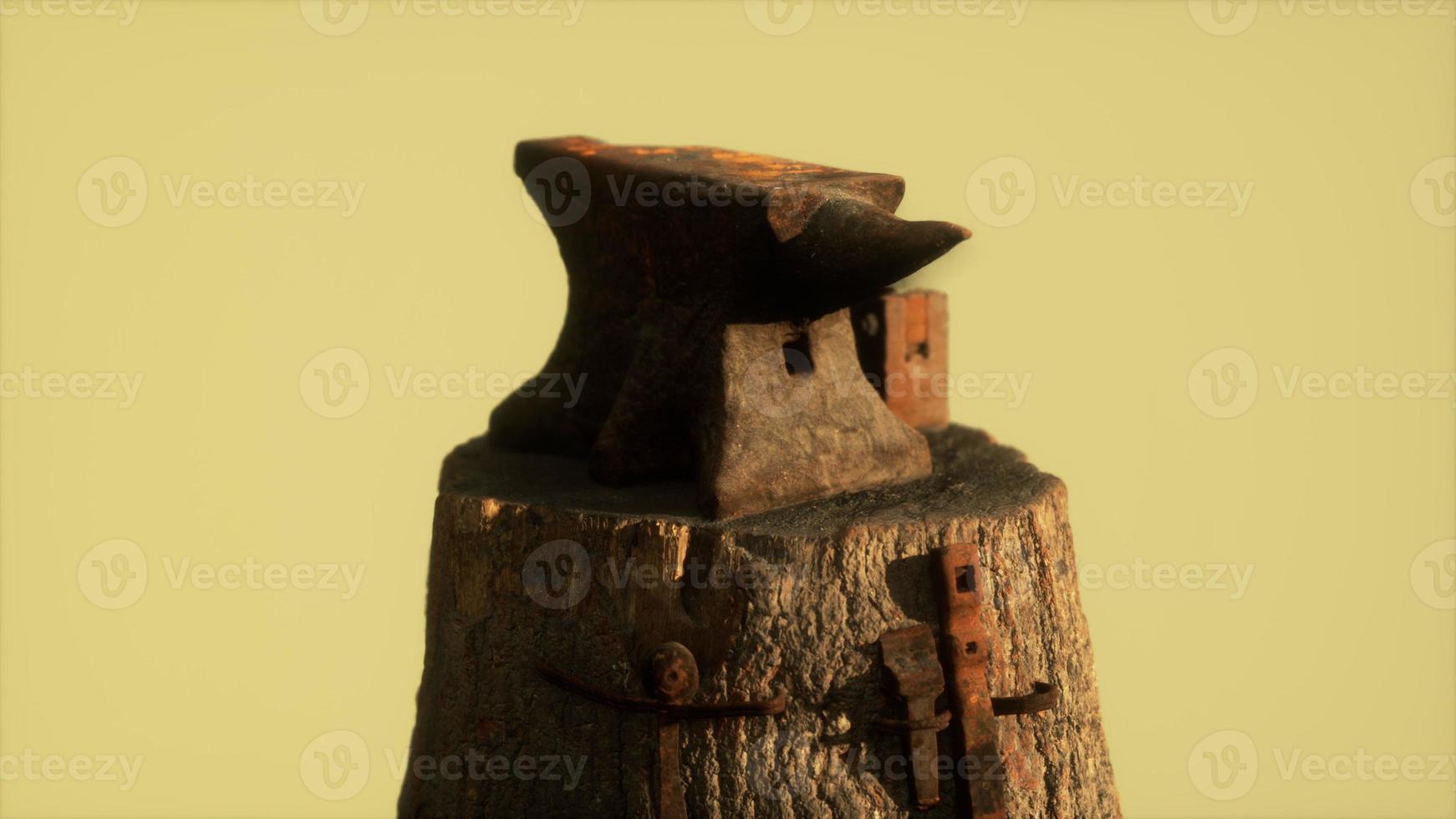 Old rusty anvil from the village forge photo