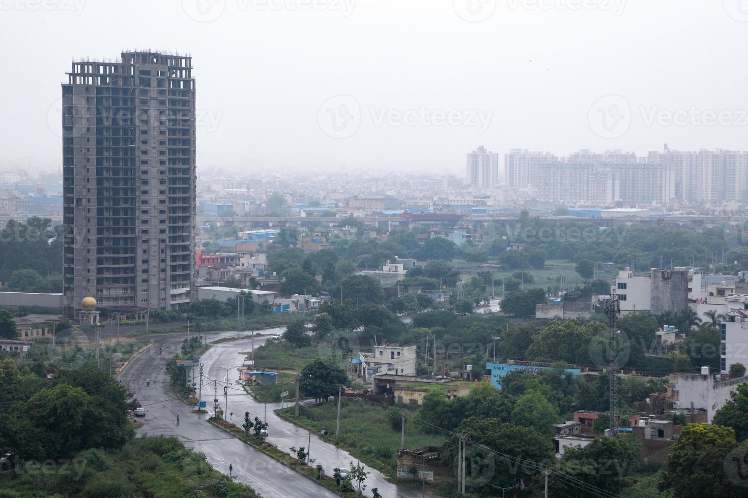 aerial landscape view of Dwarka Expressway, showing the contrast of villages and tall building. photo