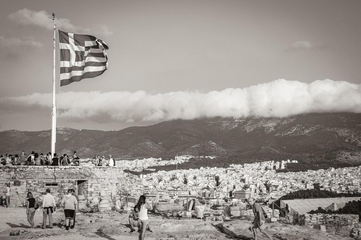 Athens Greece 04. October 2018 Greek blue white flag with ruins Acropolis of Athens Greece. photo