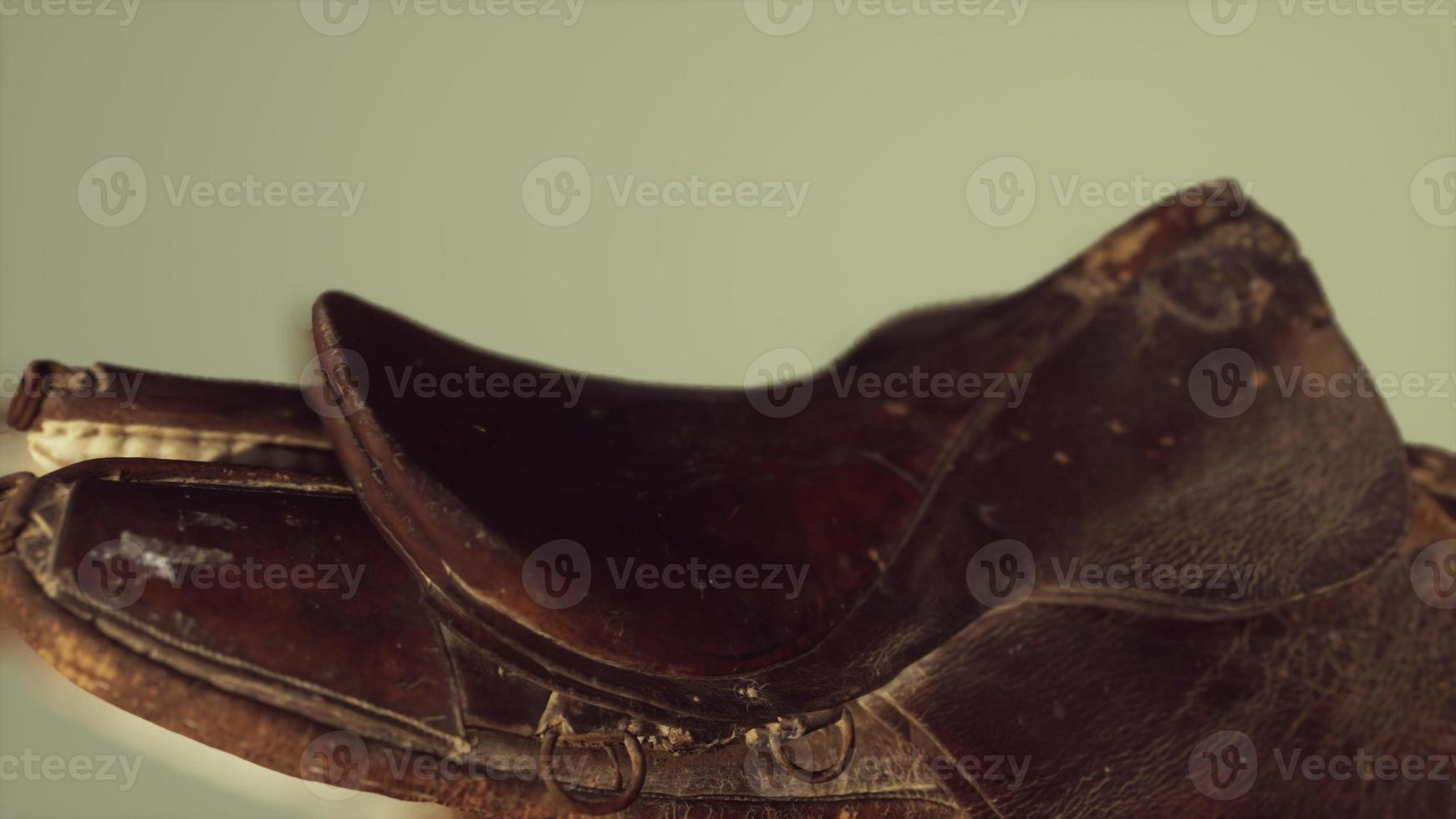old used vintage leather dressage horse saddle photo
