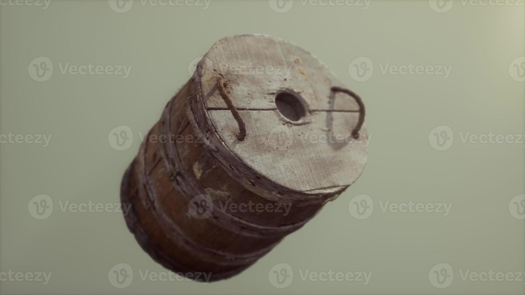 Old used rusted wooden bucket photo