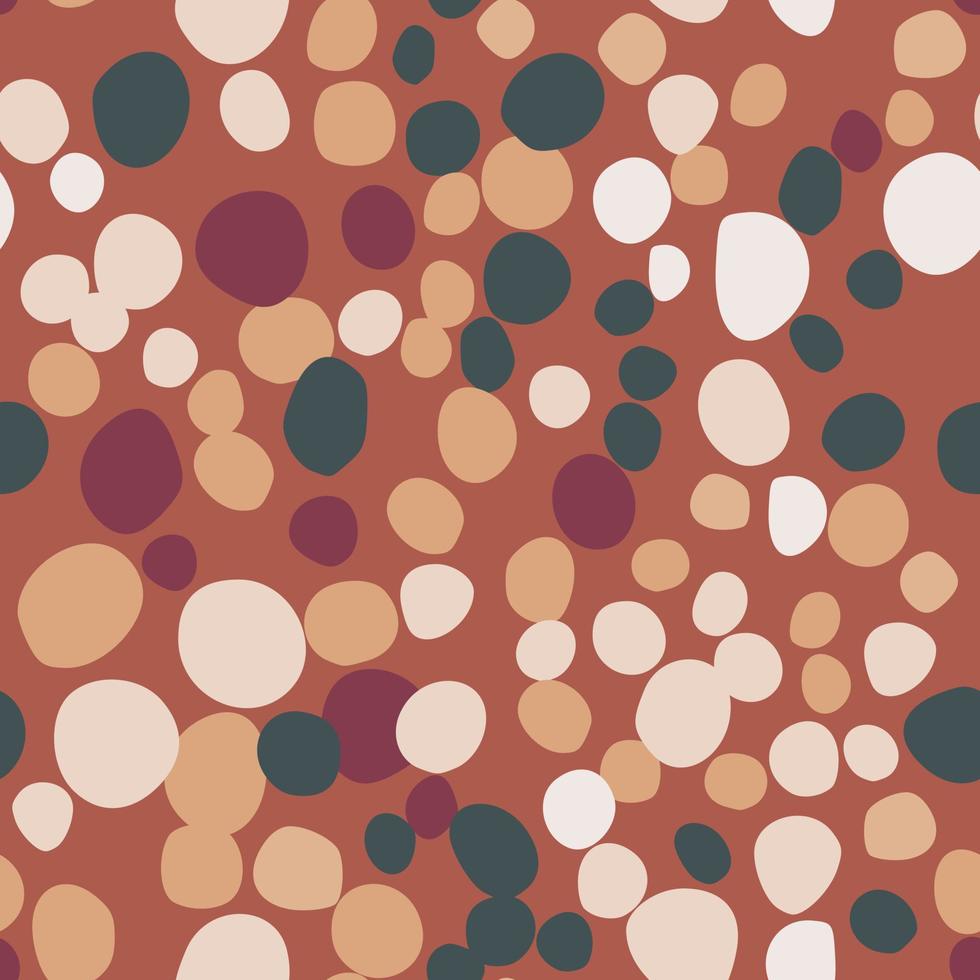 Green, light and maroon rocks simple silhouettes seamless pattern. Doodle masonry print with dark orange background. vector