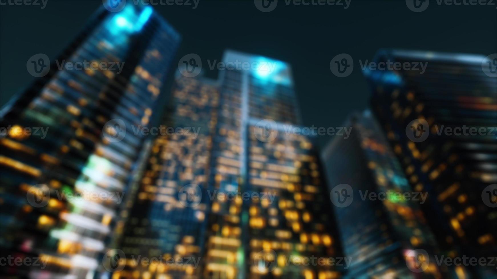 Abstract blurred bokeh at night of city as for business district background photo