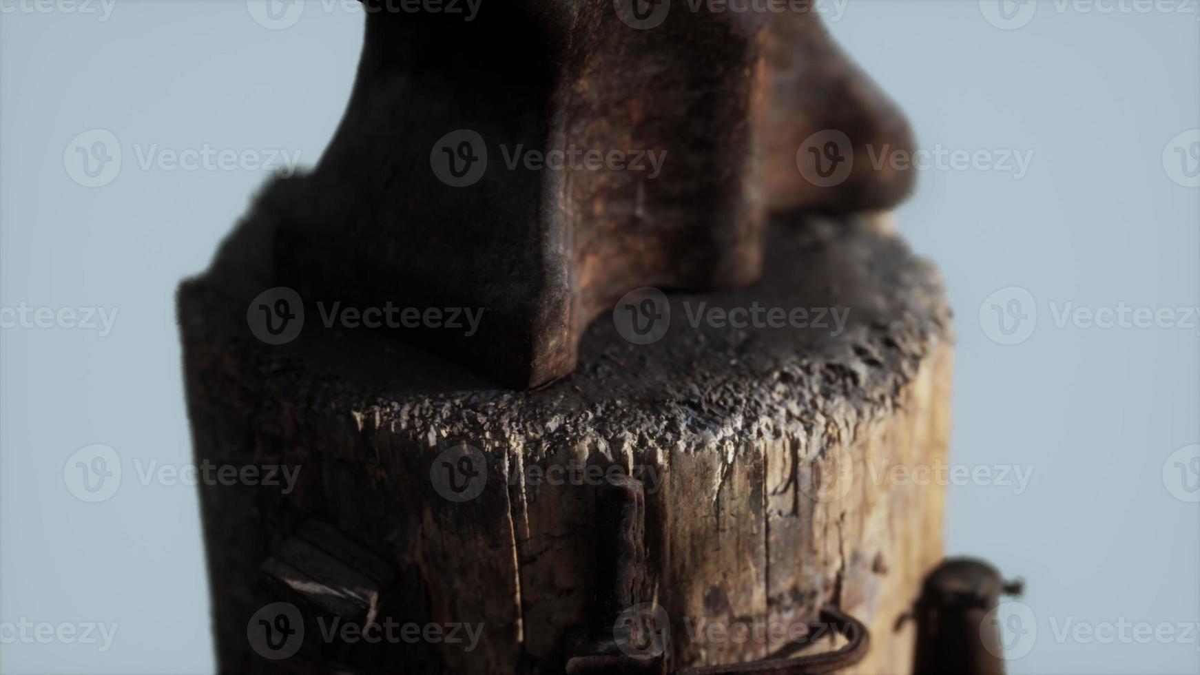 Old rusty anvil from the village forge photo