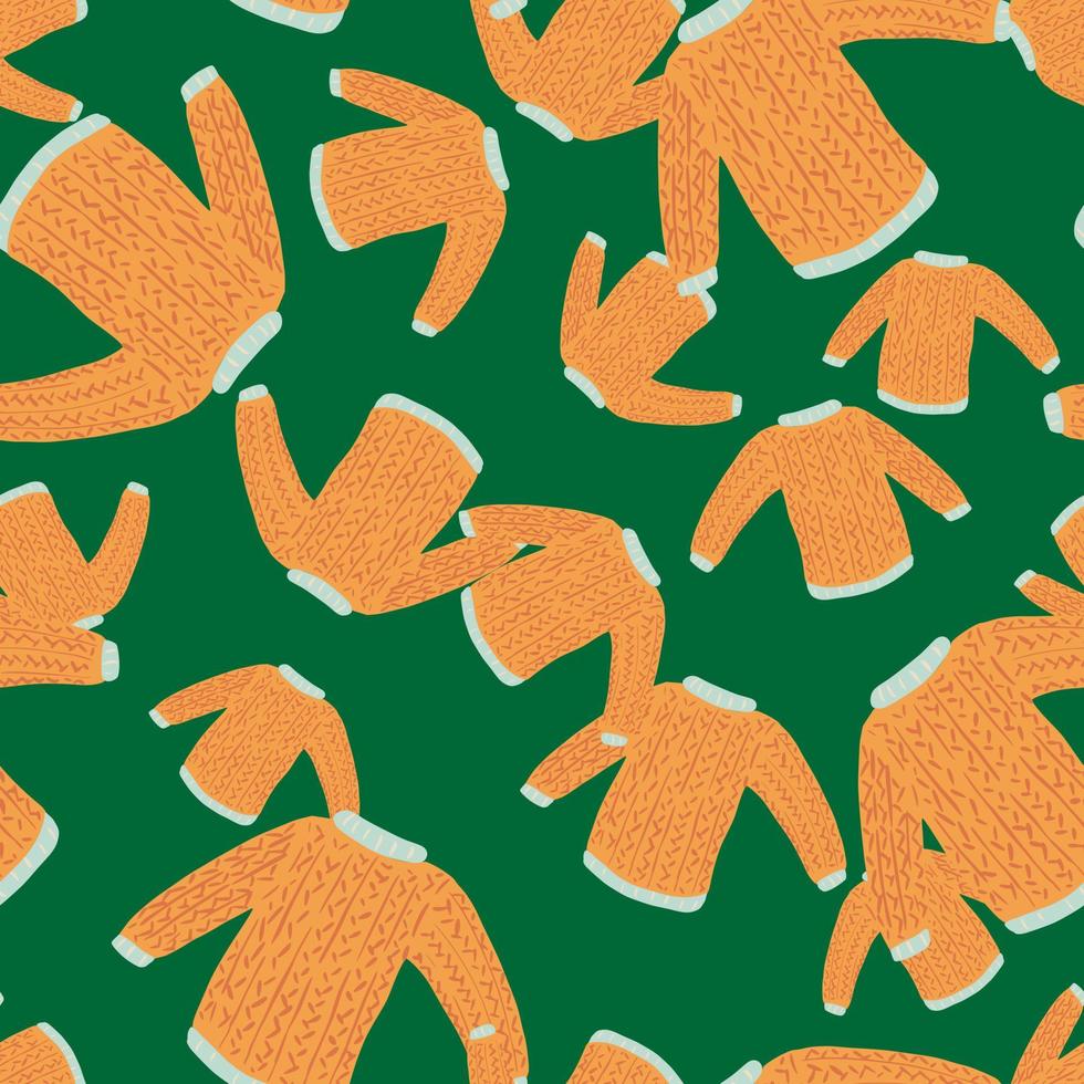 Random orange sweater knitted clothes seamless pattern. Green bright background. vector