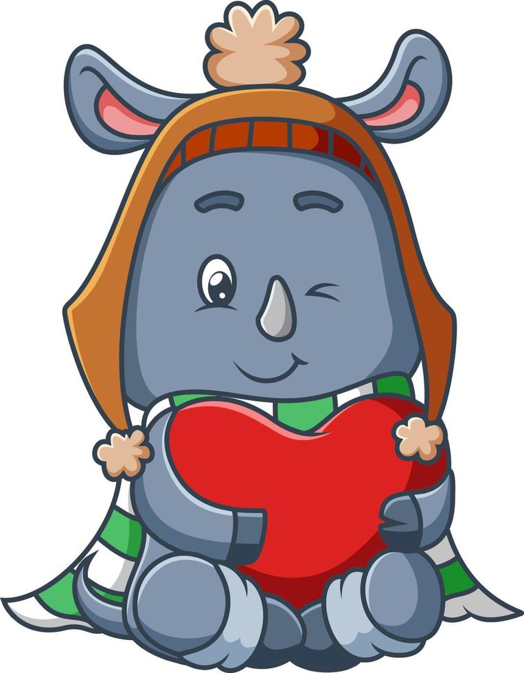 The sweet rhinoceros is holding a heart in winter season vector