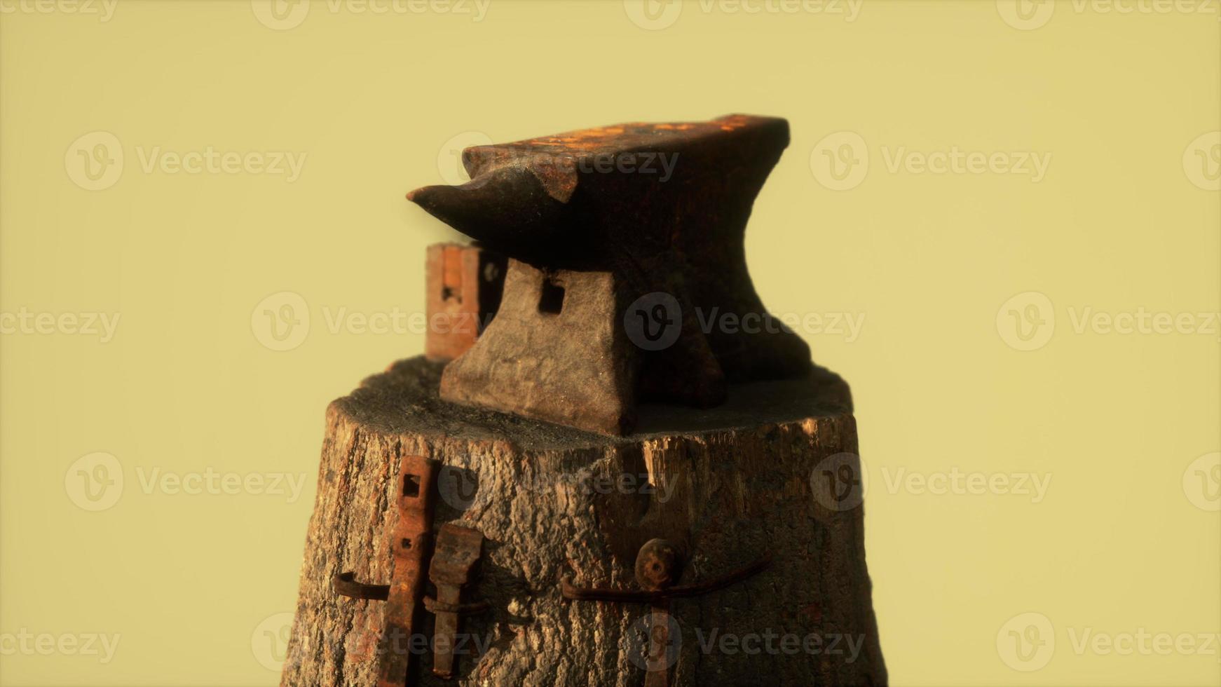 Old rusty anvil from the village forge photo