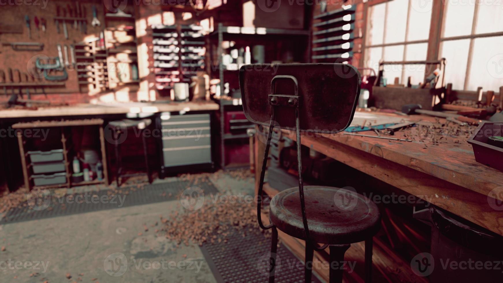 Retro stylized old tools on wooden table in a joinery photo