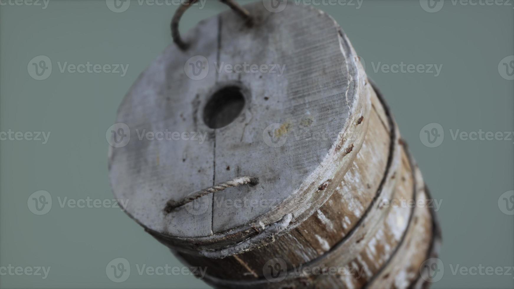 Old used rusted wooden bucket photo