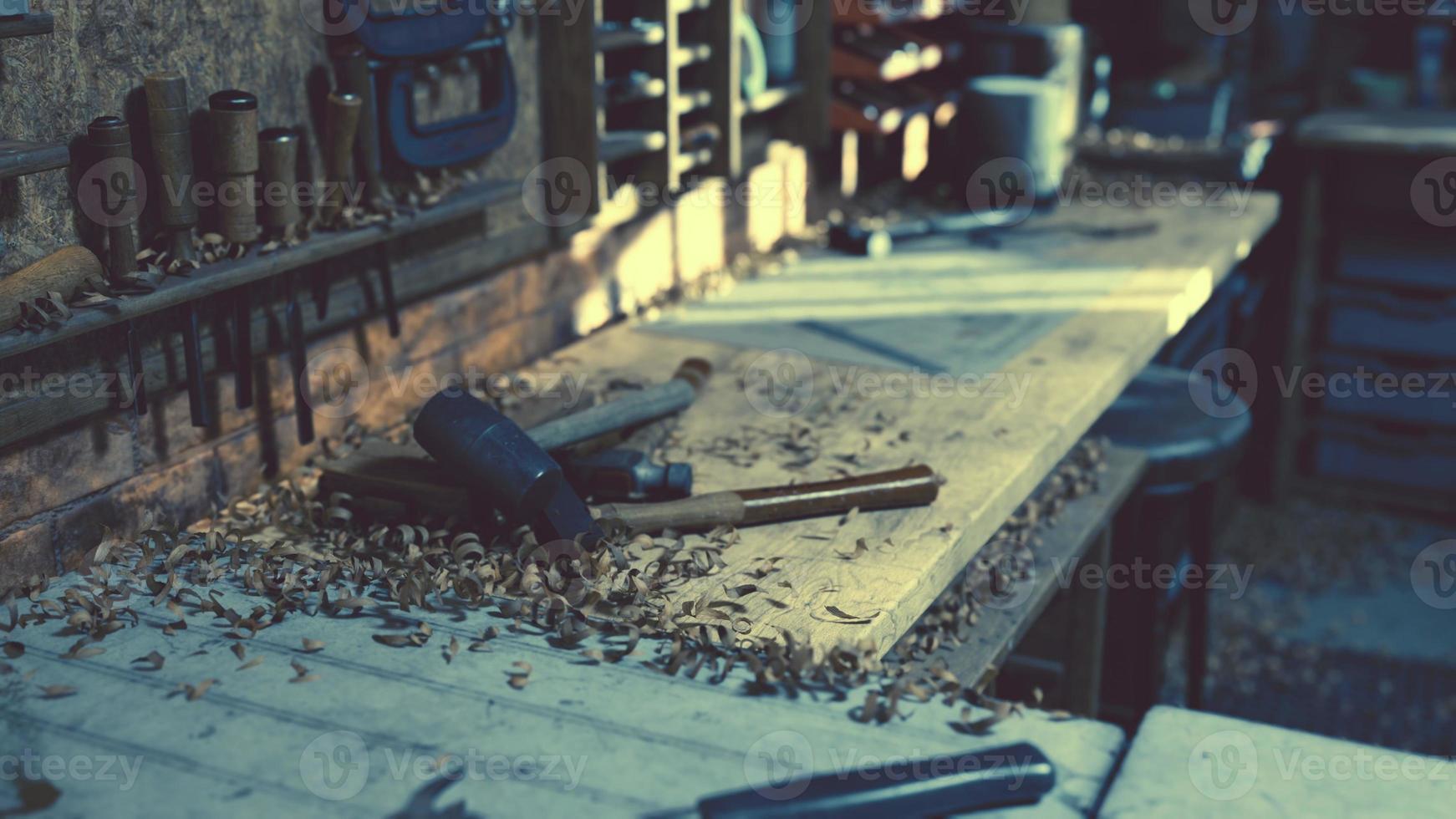 Retro stylized old tools on wooden table in a joinery photo