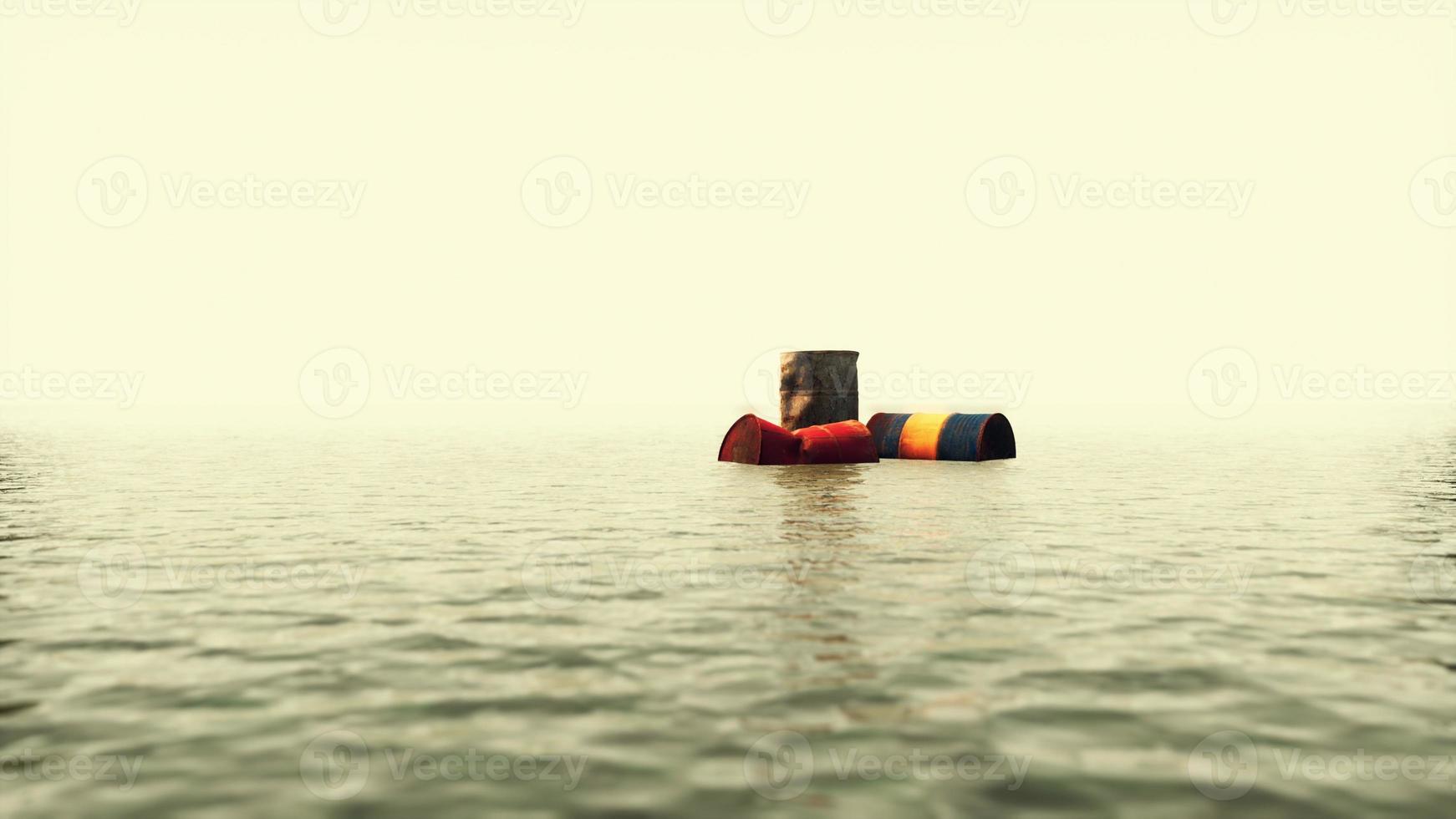 Industrial barrels thrown into the lake for garbage and make a pollution photo