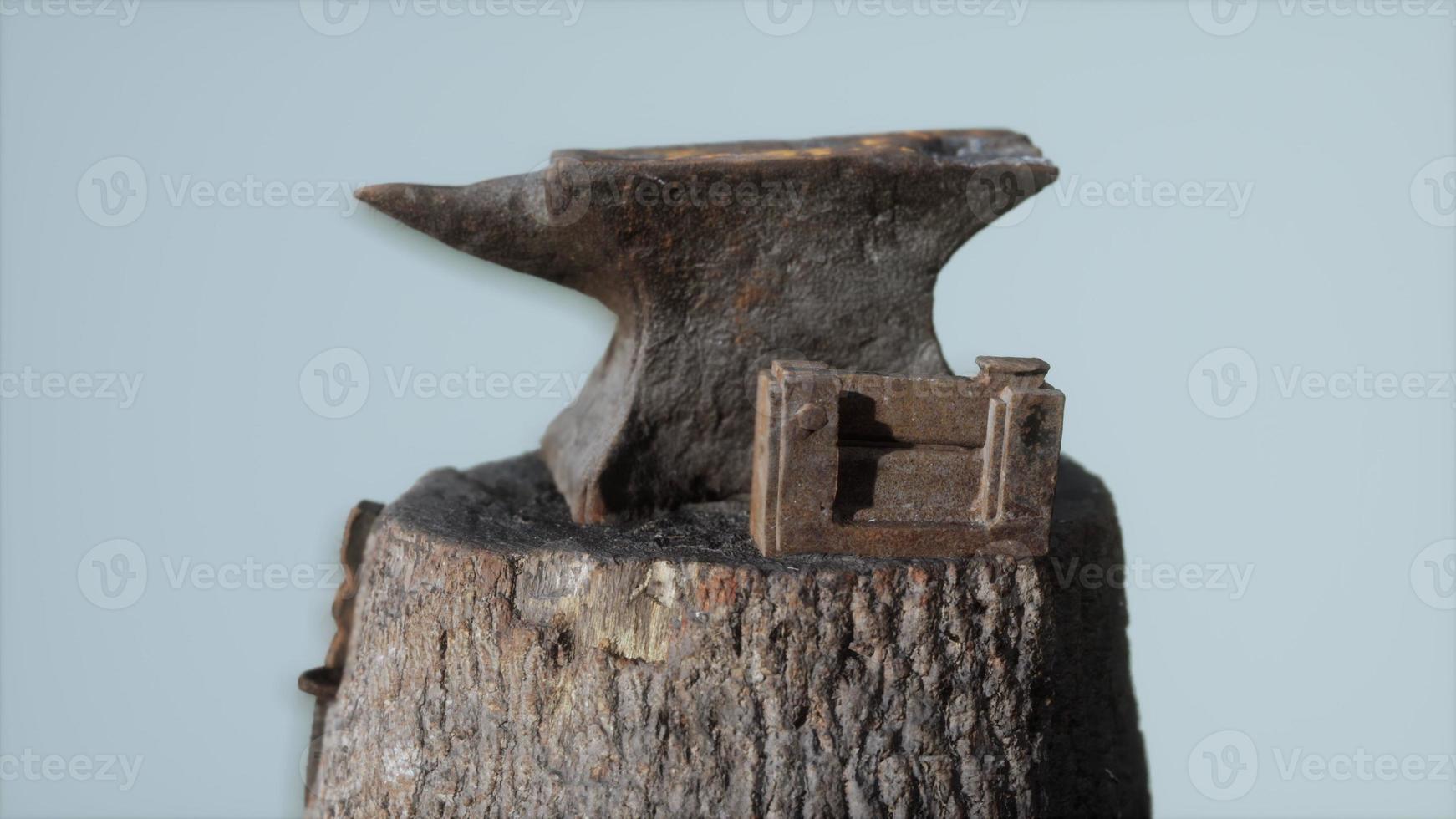 Old rusty anvil from the village forge photo