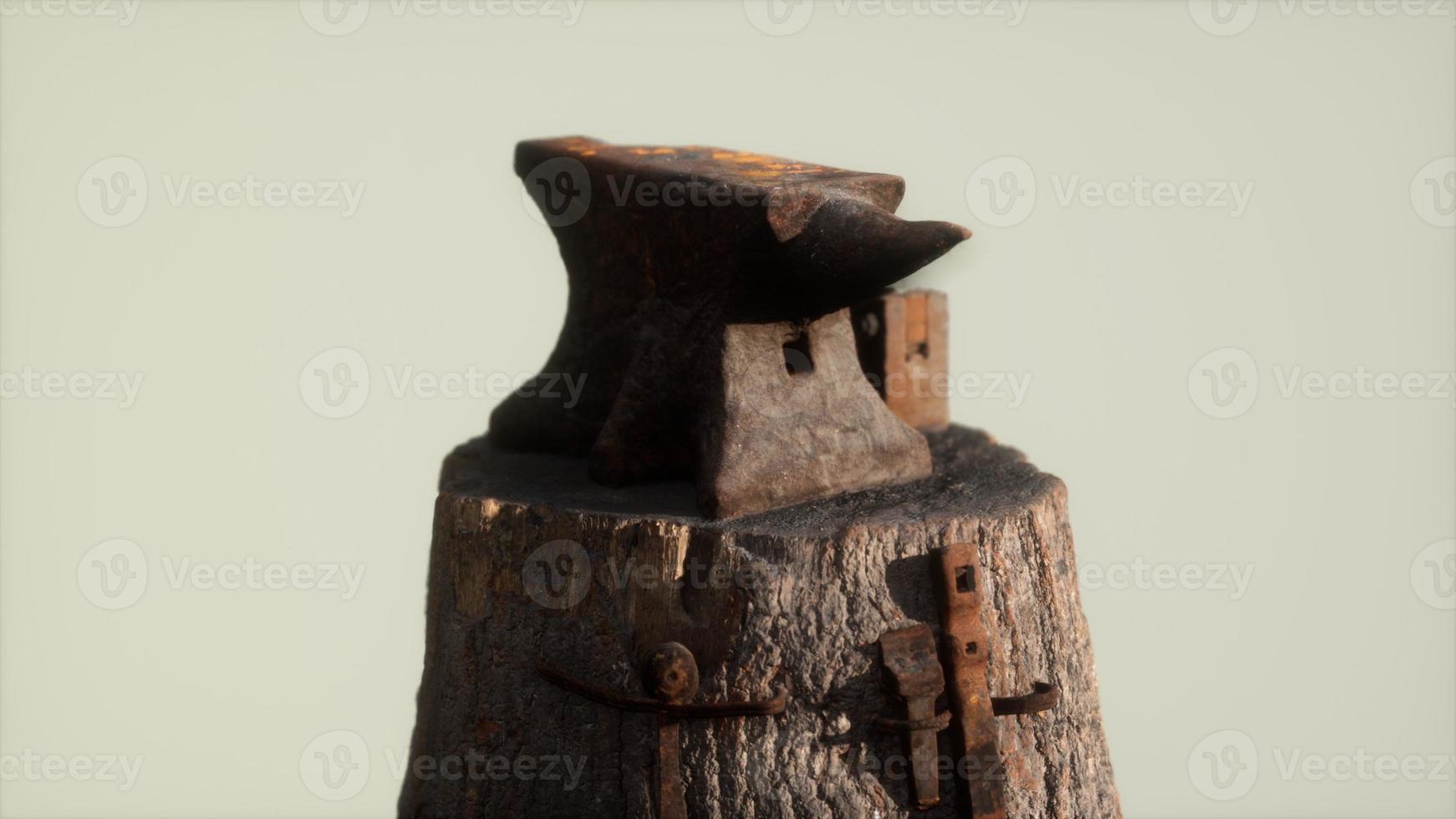 Old rusty anvil from the village forge photo