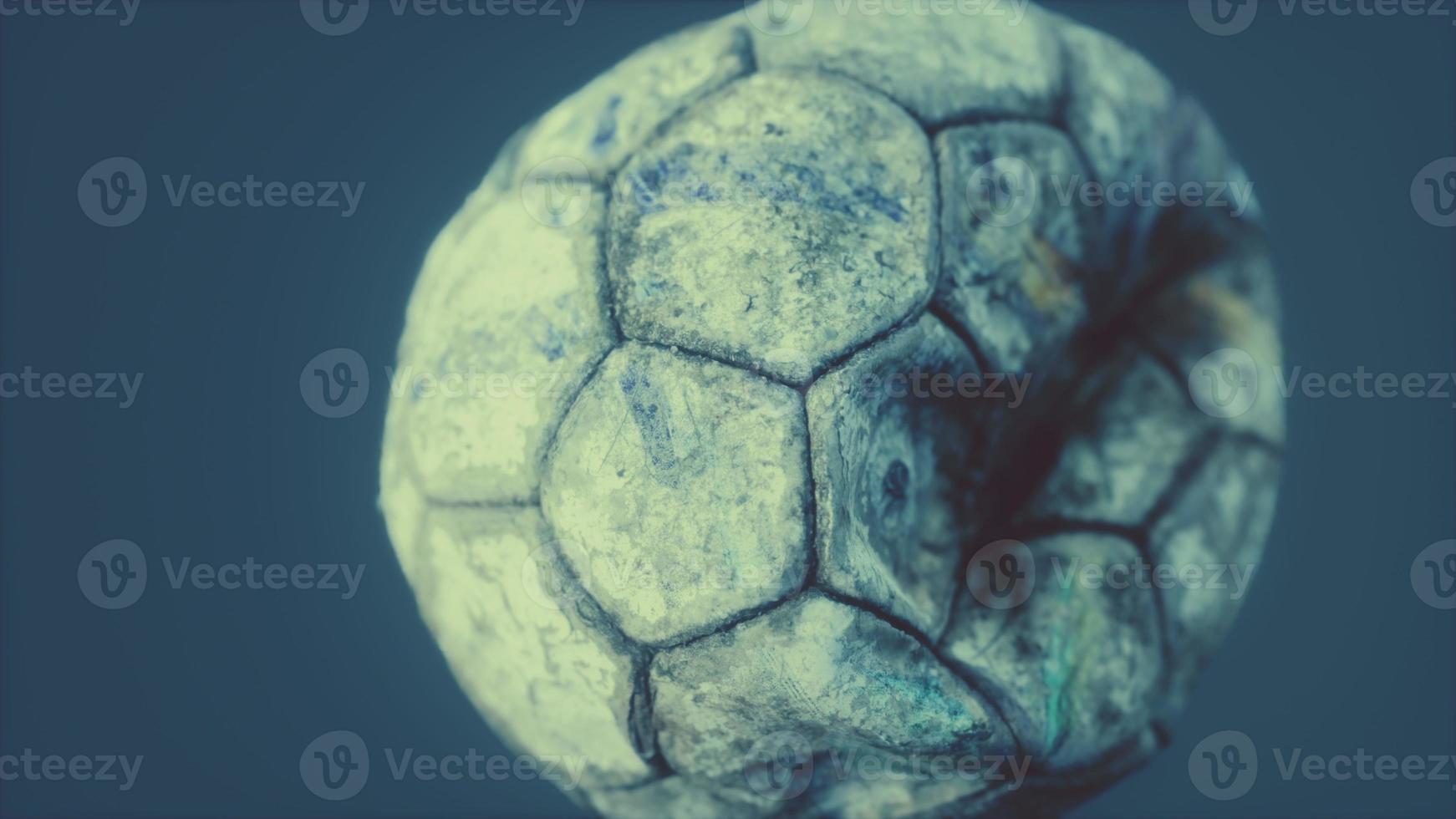 old deflated leather soccer ball photo