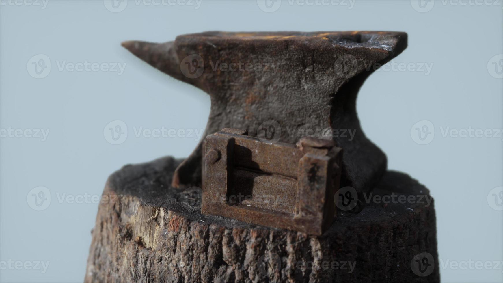 Old rusty anvil from the village forge photo