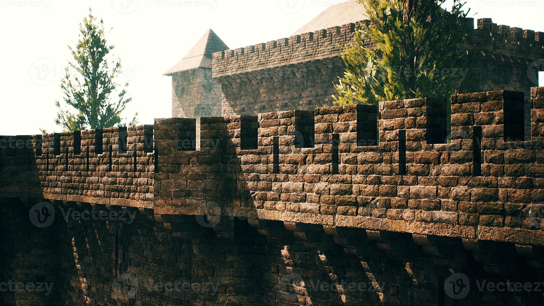 old castle walls at the sunset photo