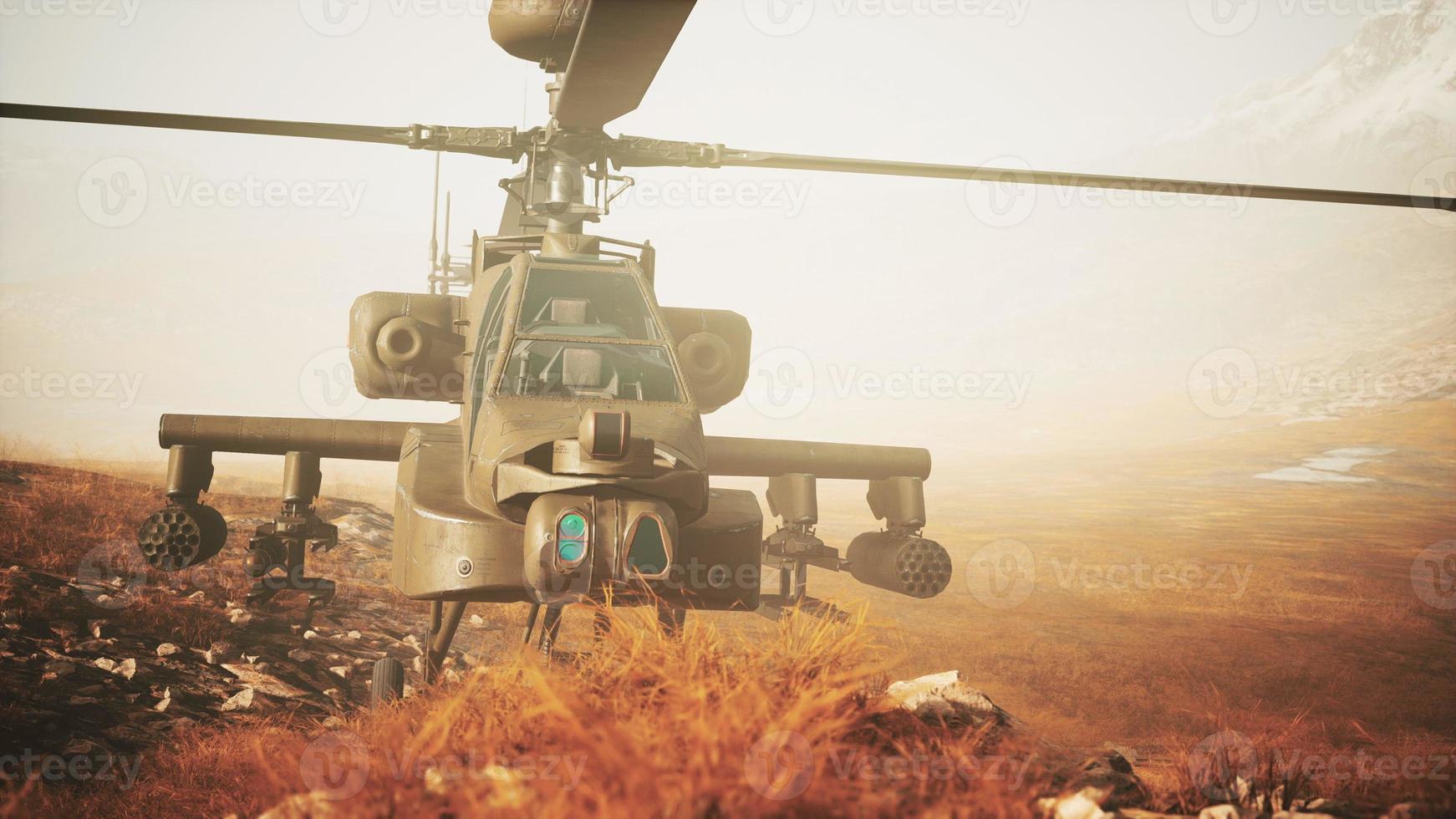 military helicopter in mountains at war photo