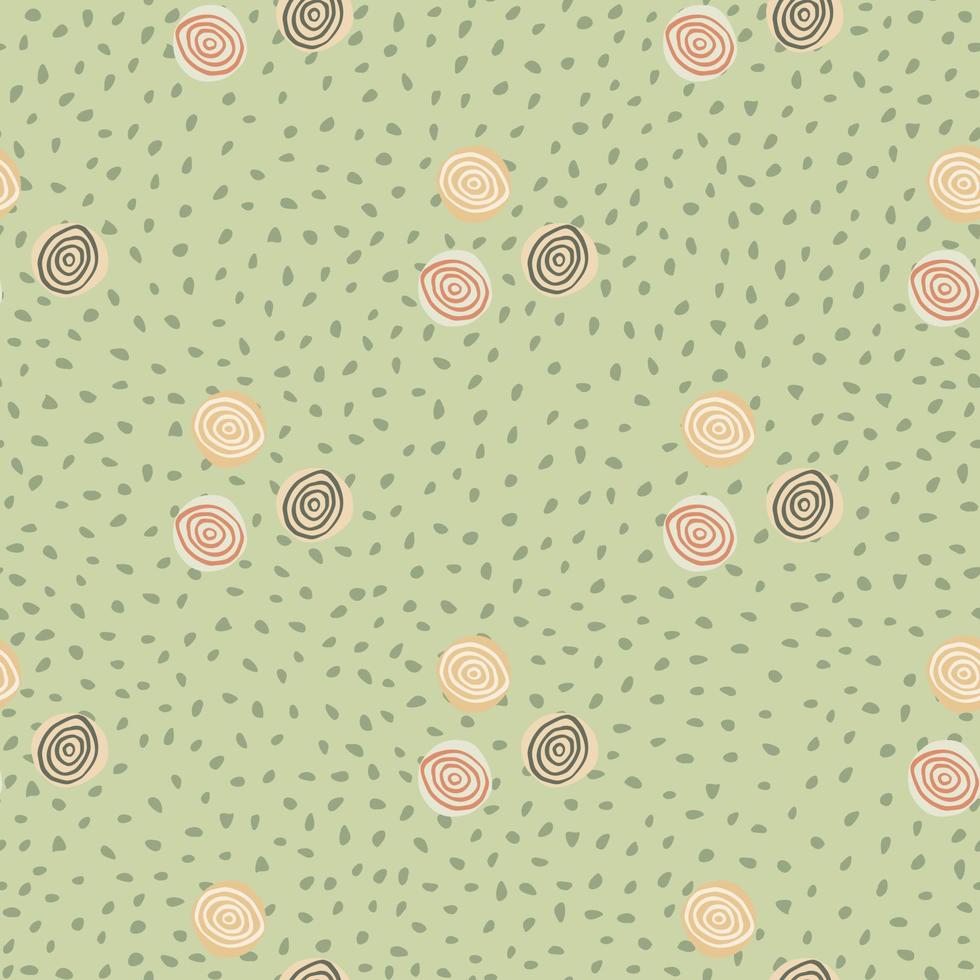 Pastel childish pattern with yellow, green and orange spirals. Green background with dots. vector