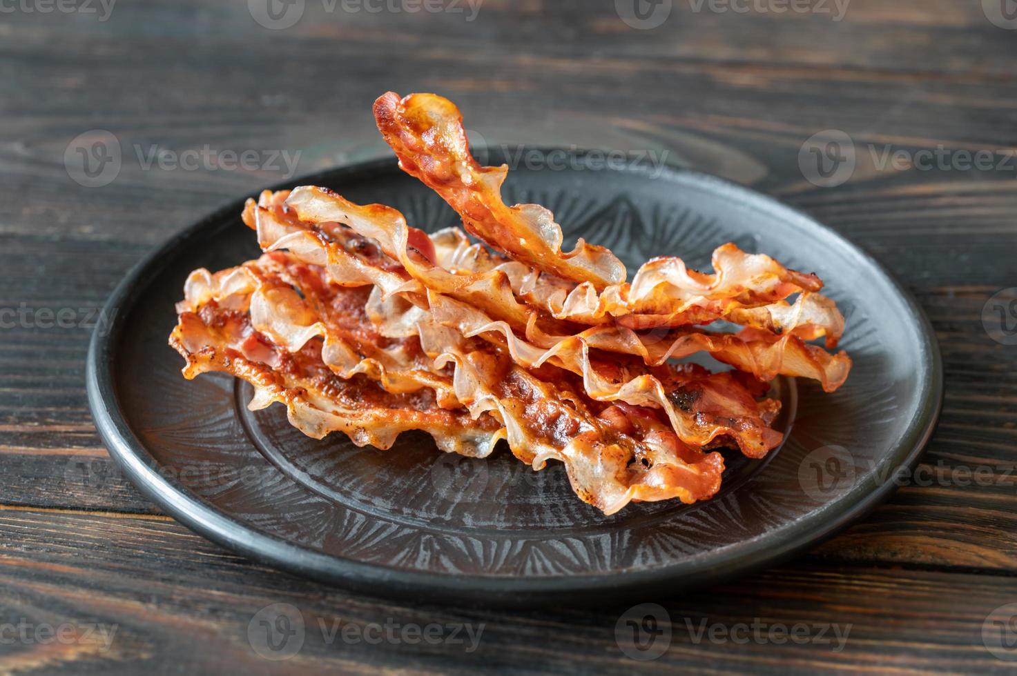 Fried bacon strips photo