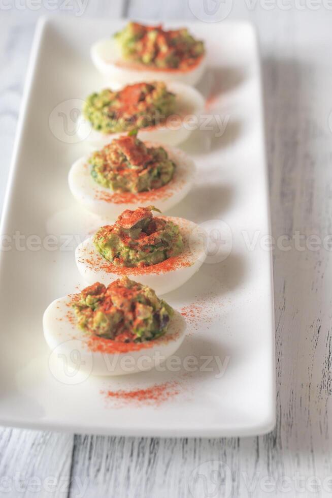 Guacamole and bacon deviled eggs 5664223 Stock Photo at Vecteezy