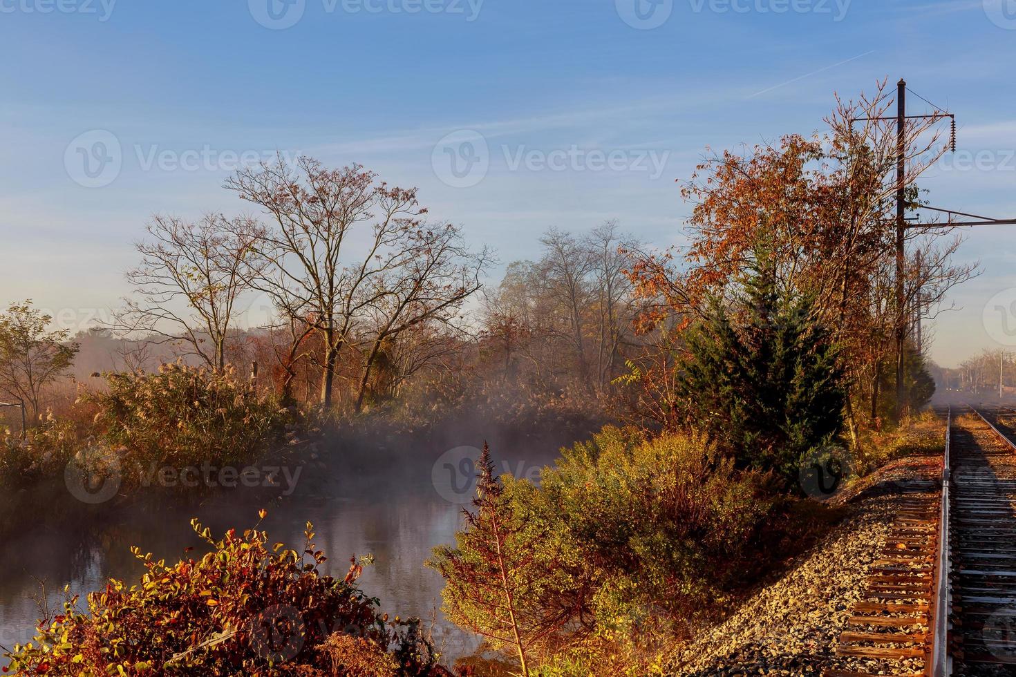 Foggy morning on the river photo