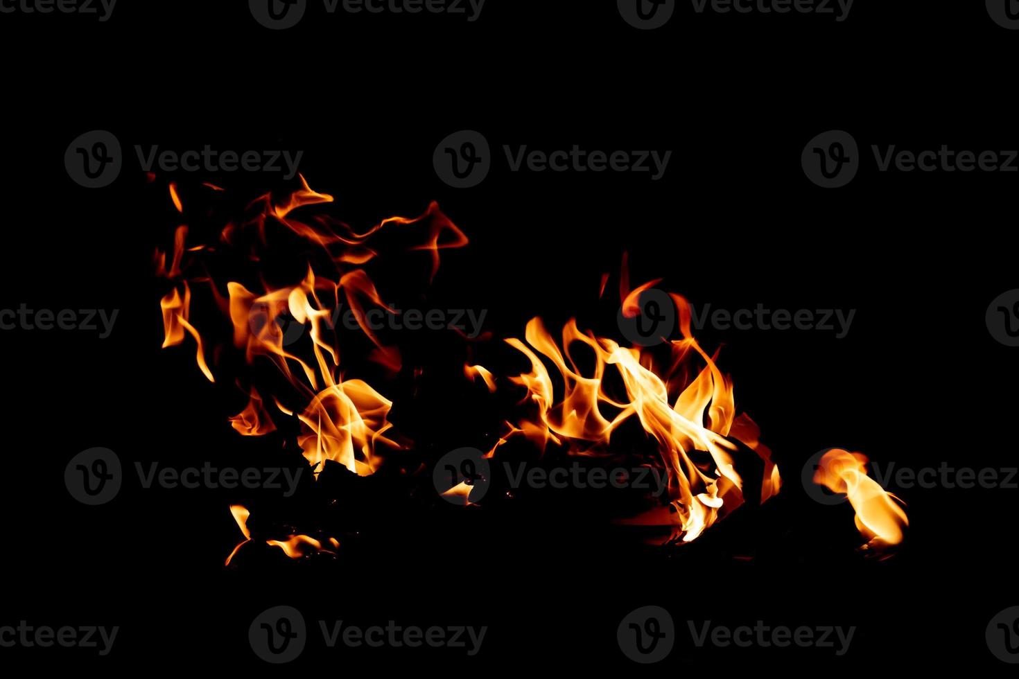 Fire flame texture. Burning material backdrop. Burn effect pattern. Blaze and torch wallpaper. Heat and haze backdrop. photo