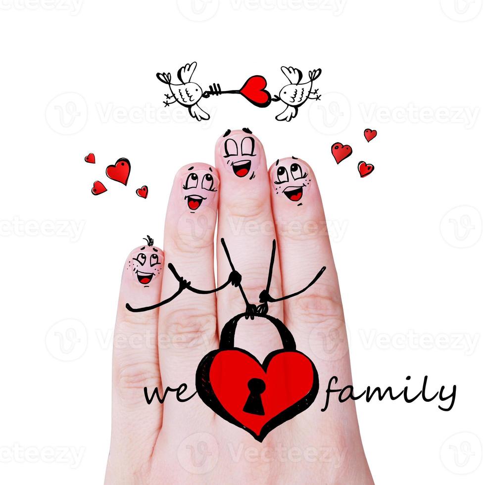 Finger puppets of loving parents with young child hugging and having fun. photo