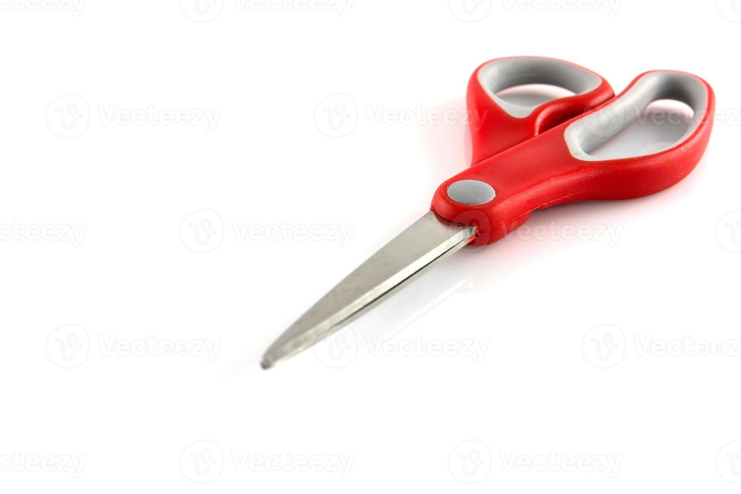 red scissors isolate on white background photo