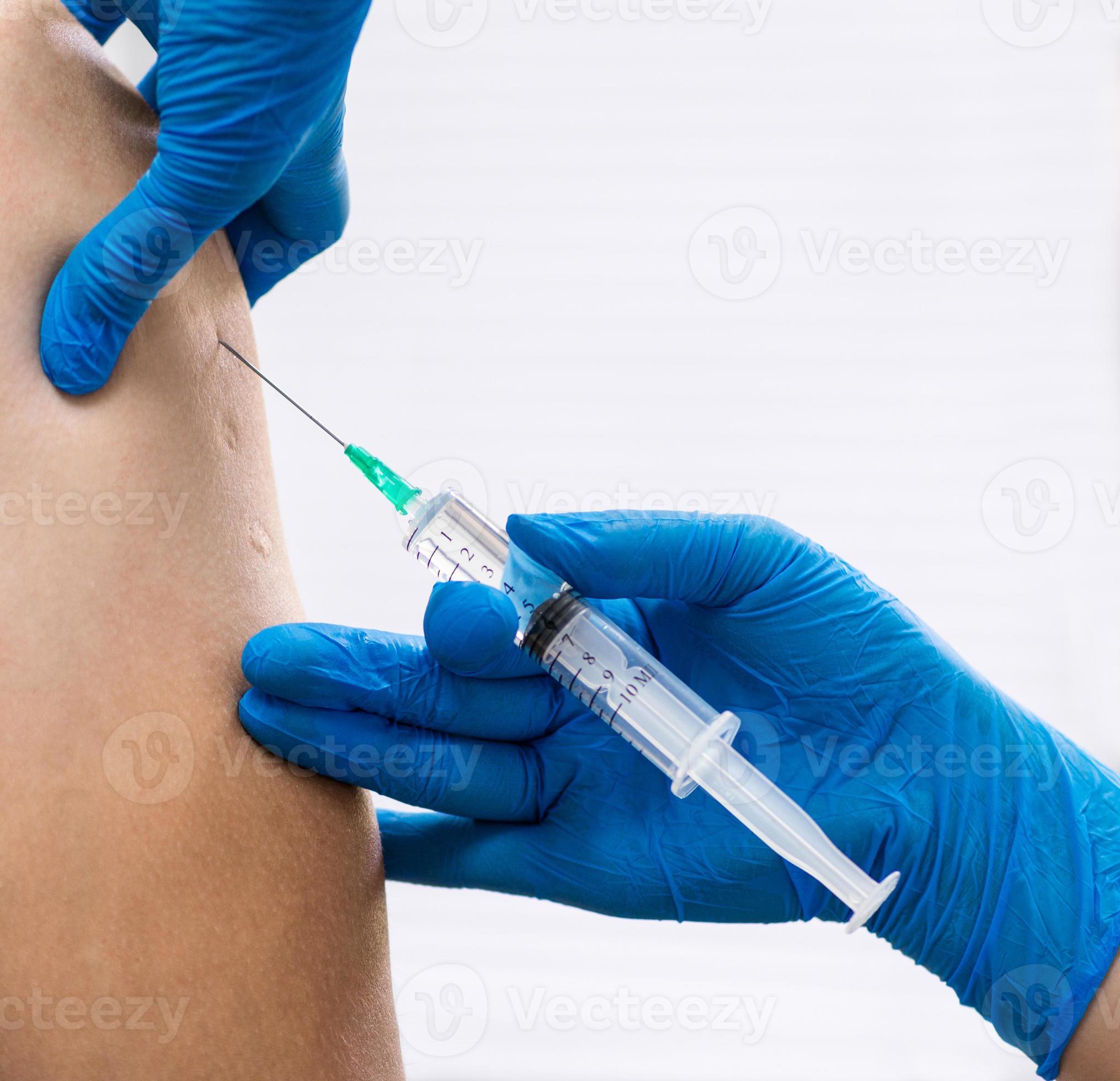 doctor gives an injection to the patient closeup 5667678 Stock Photo doctor gives an injection to the patient closeup 5667678 Stock Photo