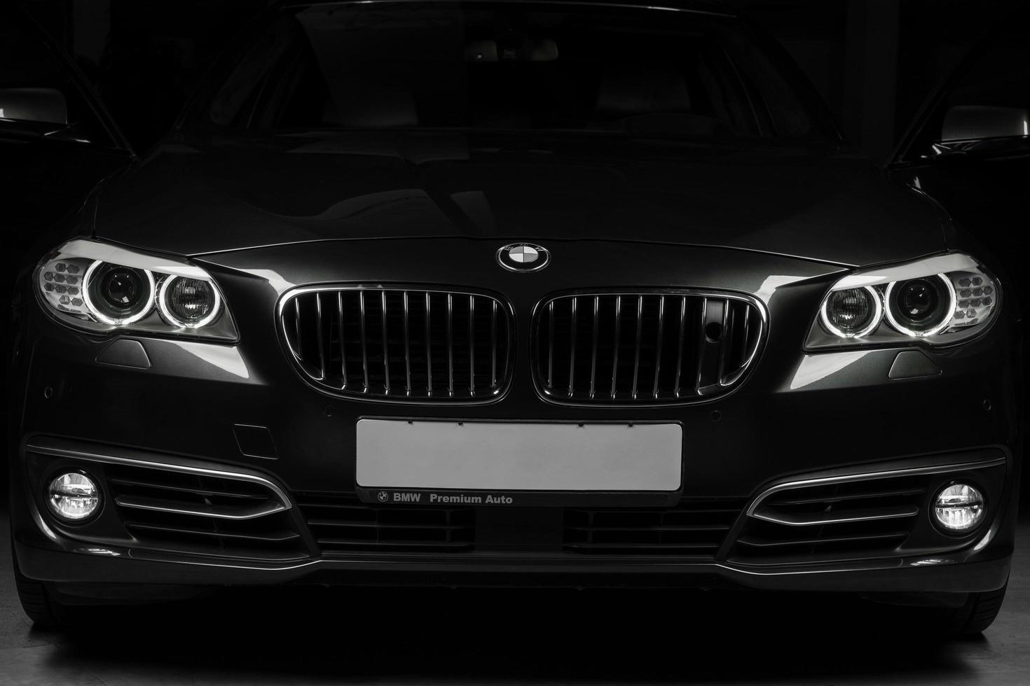 Tashkent, Uzbekistan - August 26, 2014 - the front of the car brand BMW black color photo