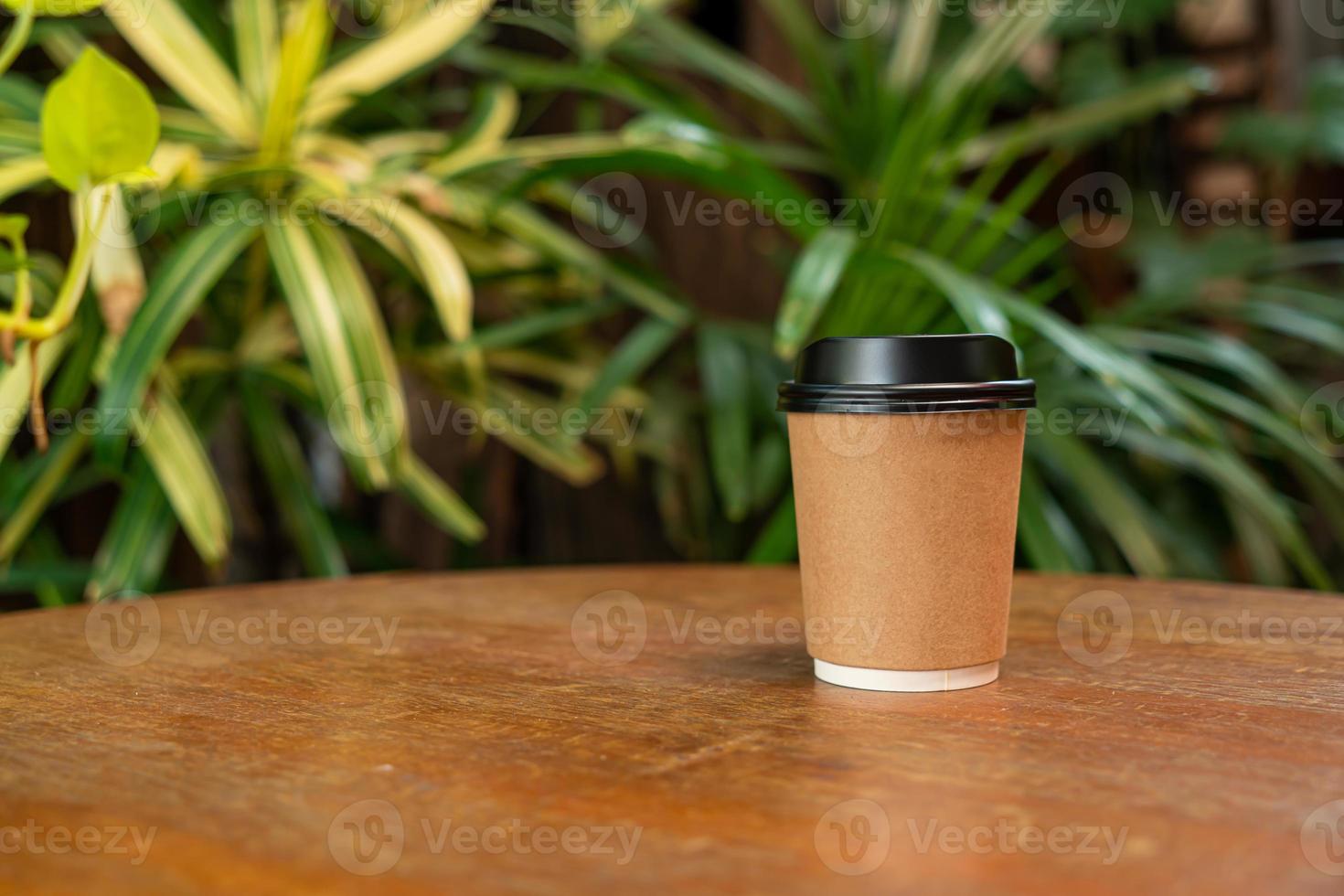 hot coffee cup on wood table photo