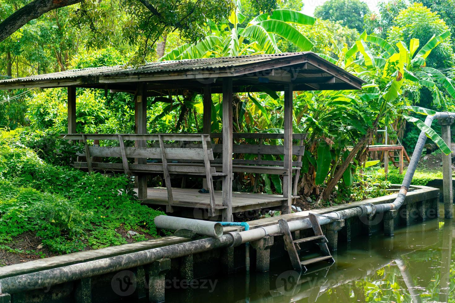 wooden pavilion by the canal photo