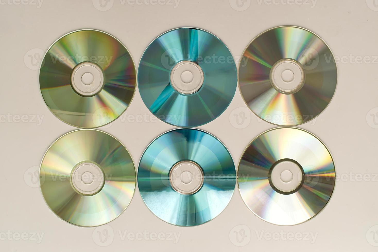 CD and DVD disk on white background. Technology from the 90s photo