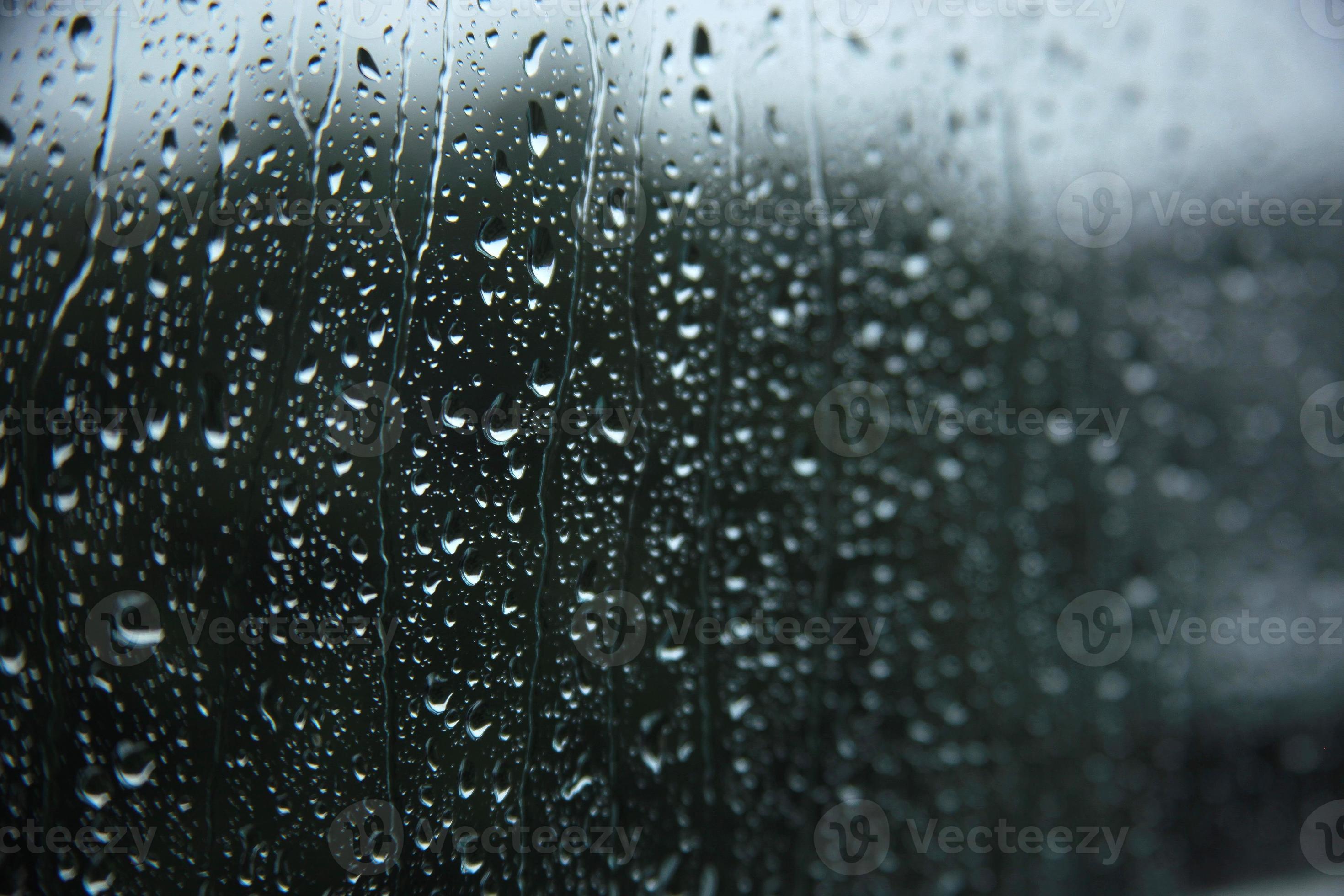 Blurry Rain Drops On Window Glasses Surface With Cloudy Background Dramatic Background Concept Stock Photo At Vecteezy
