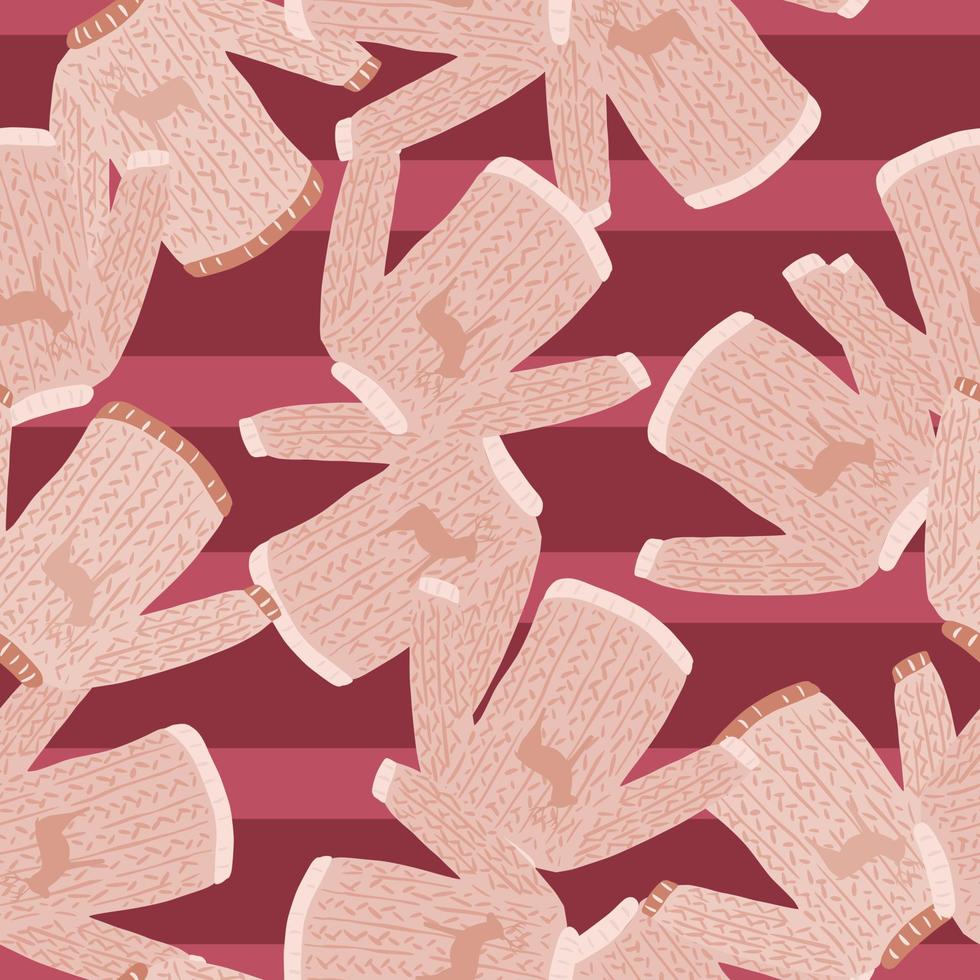 Simple seamless pattern with light pink sweaters doodle print on striped background. vector