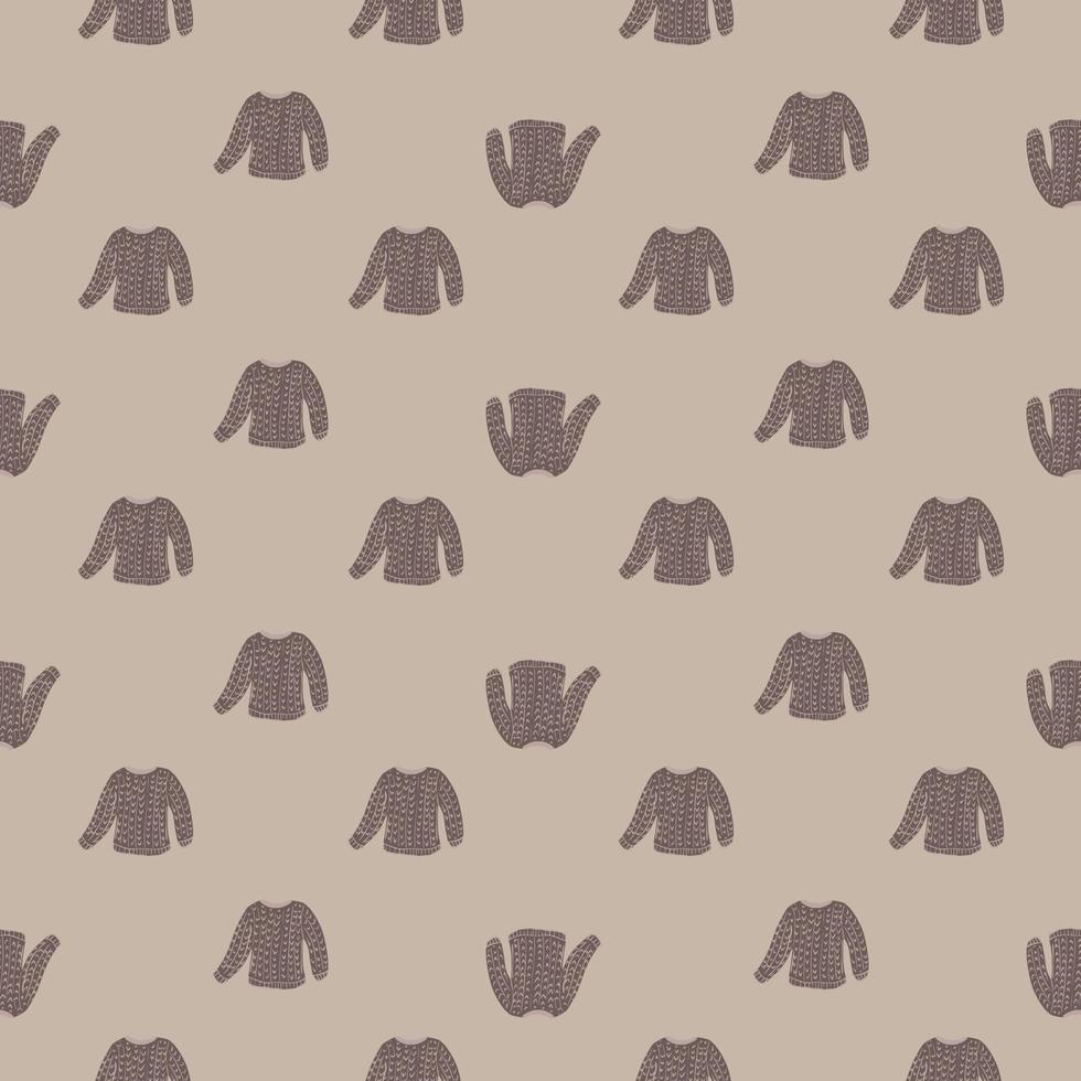 Pale tones seamless pattern with little knitted sweaters ornament. Grey colored background. vector